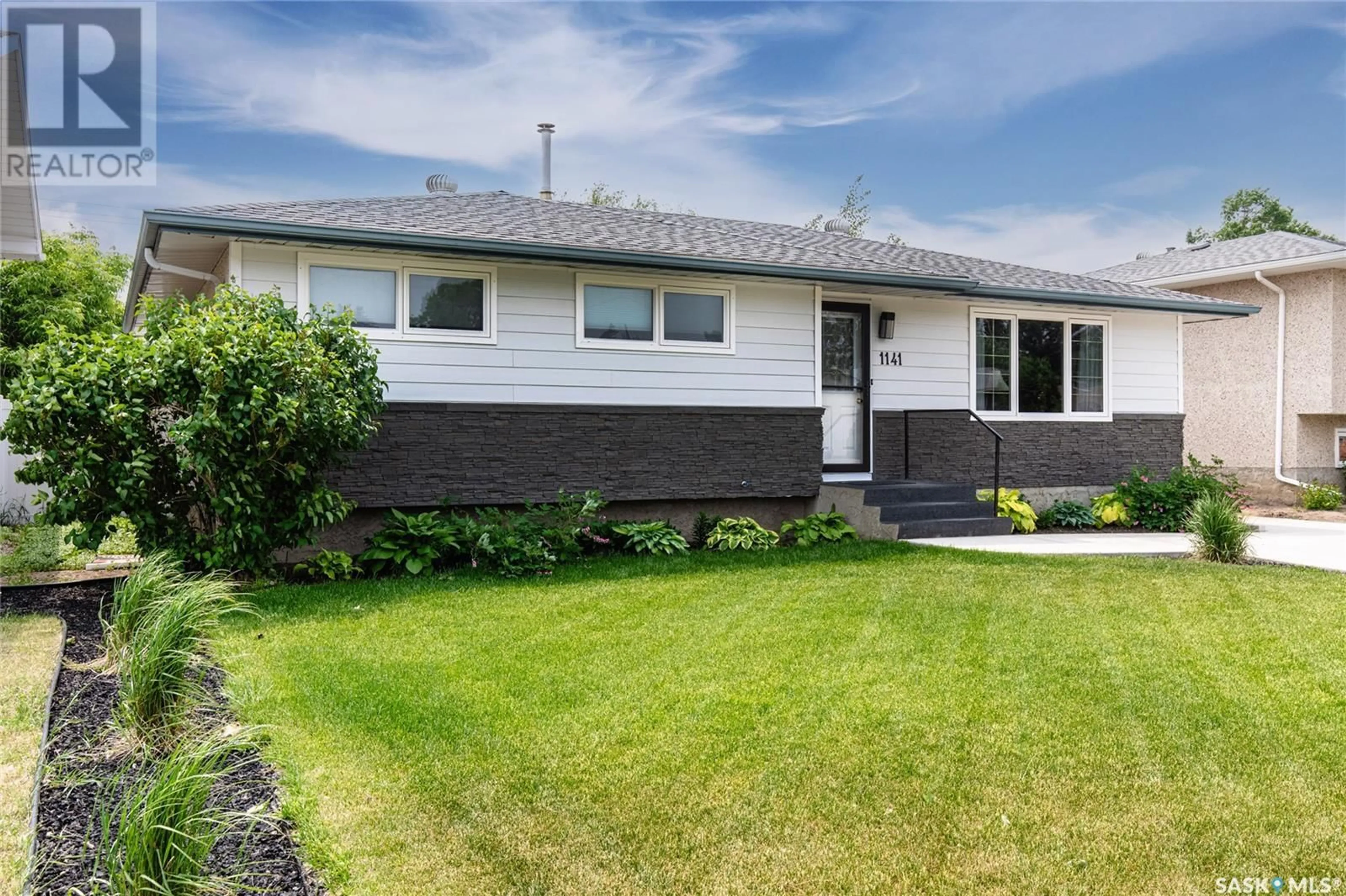 Home with vinyl exterior material, street for 1141 WARNER STREET, Moose Jaw Saskatchewan S6H6J8