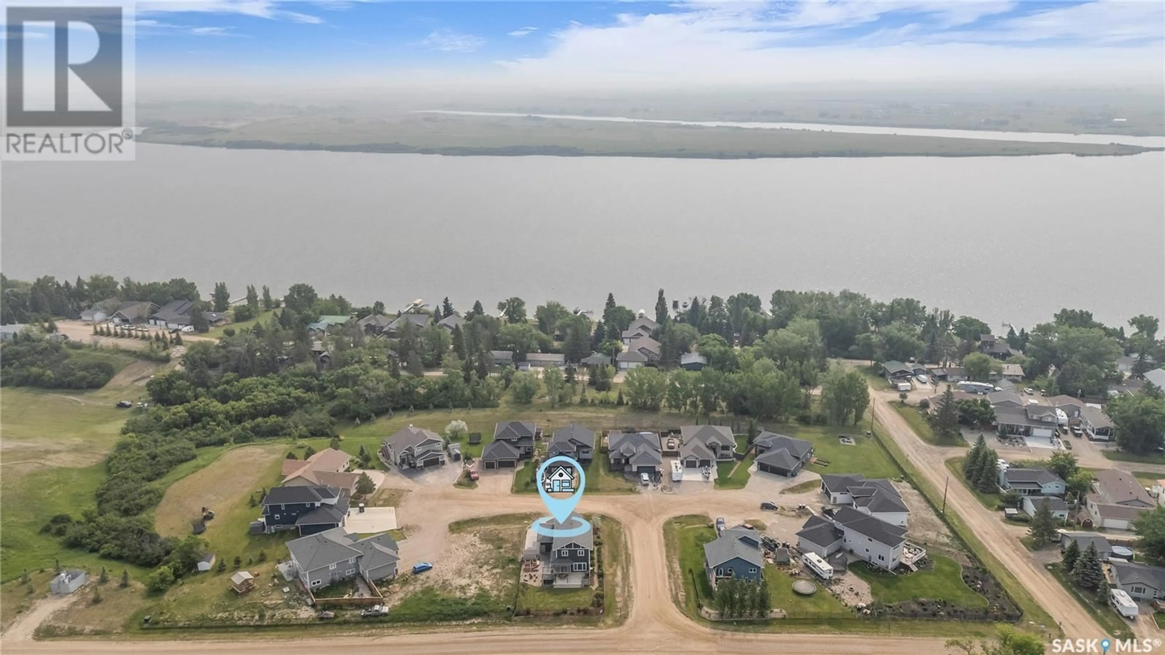 A pic from outside/outdoor area/front of a property/back of a property/a pic from drone, water/lake/river/ocean view for 14 WILLOW VIEW COURT, Shields Saskatchewan S7C0A3