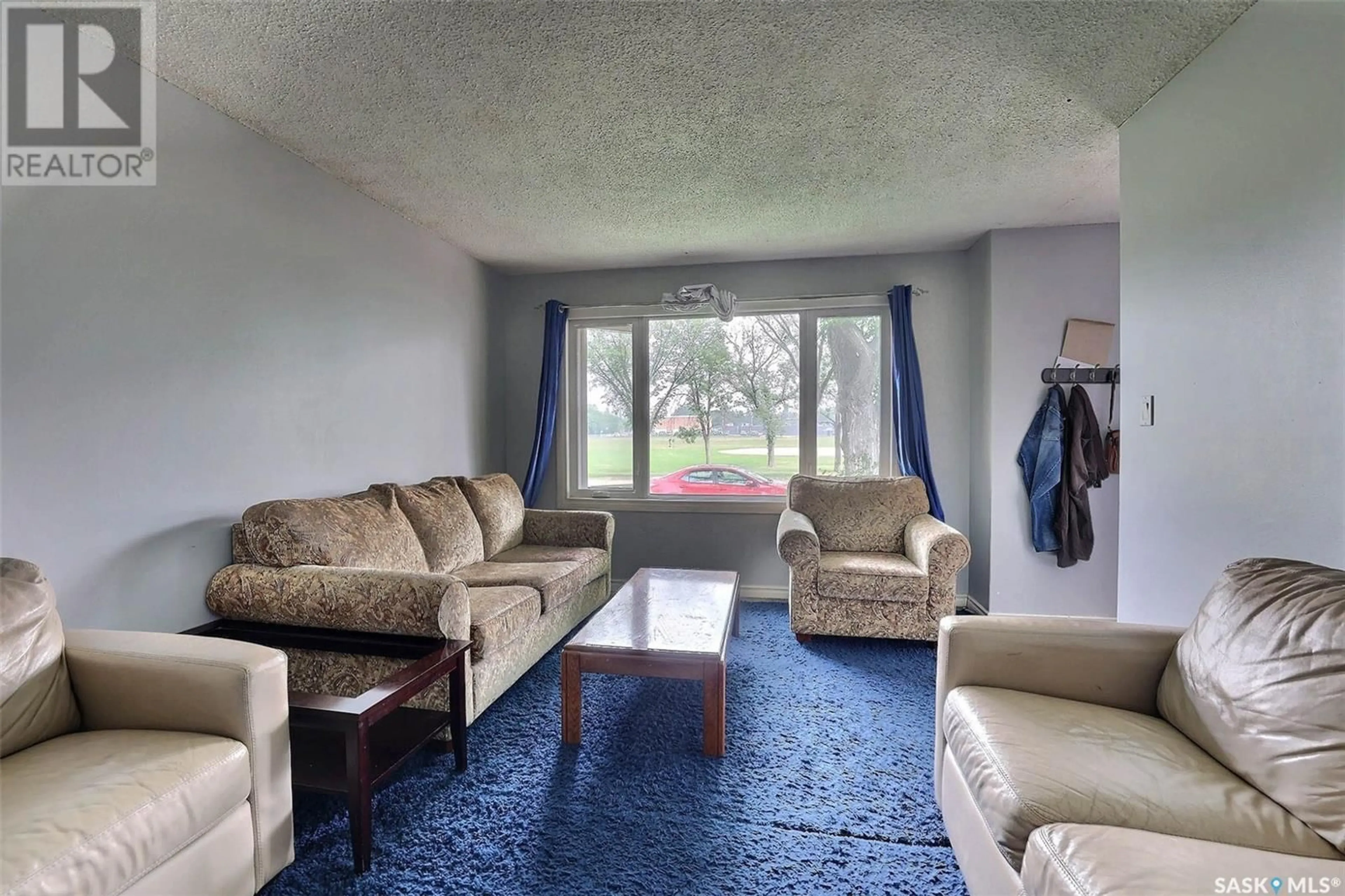 Living room with furniture, carpet floor for 12 LYONS STREET, Regina Saskatchewan S4T6G1
