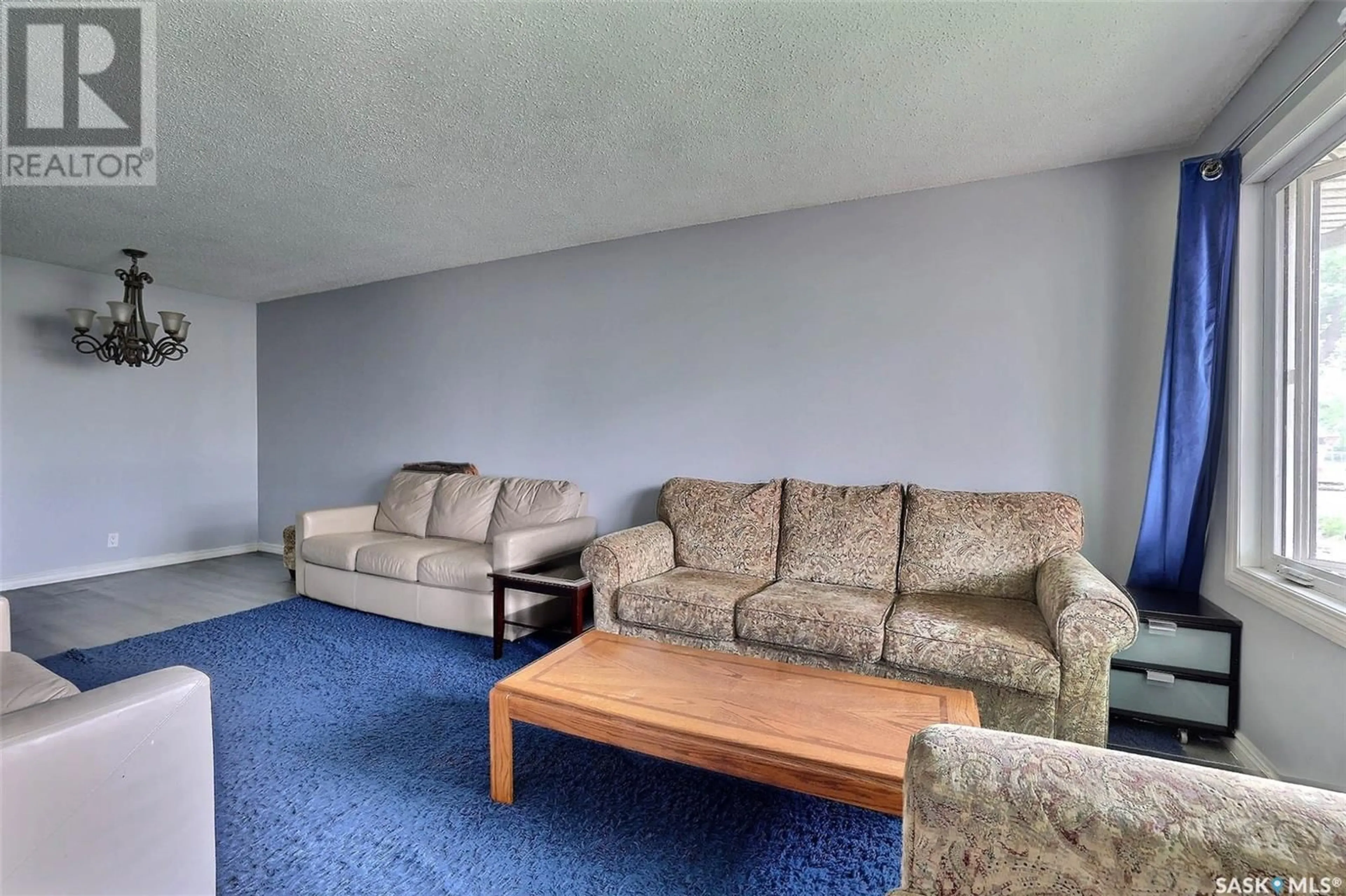 Living room with furniture, carpet floor for 12 LYONS STREET, Regina Saskatchewan S4T6G1