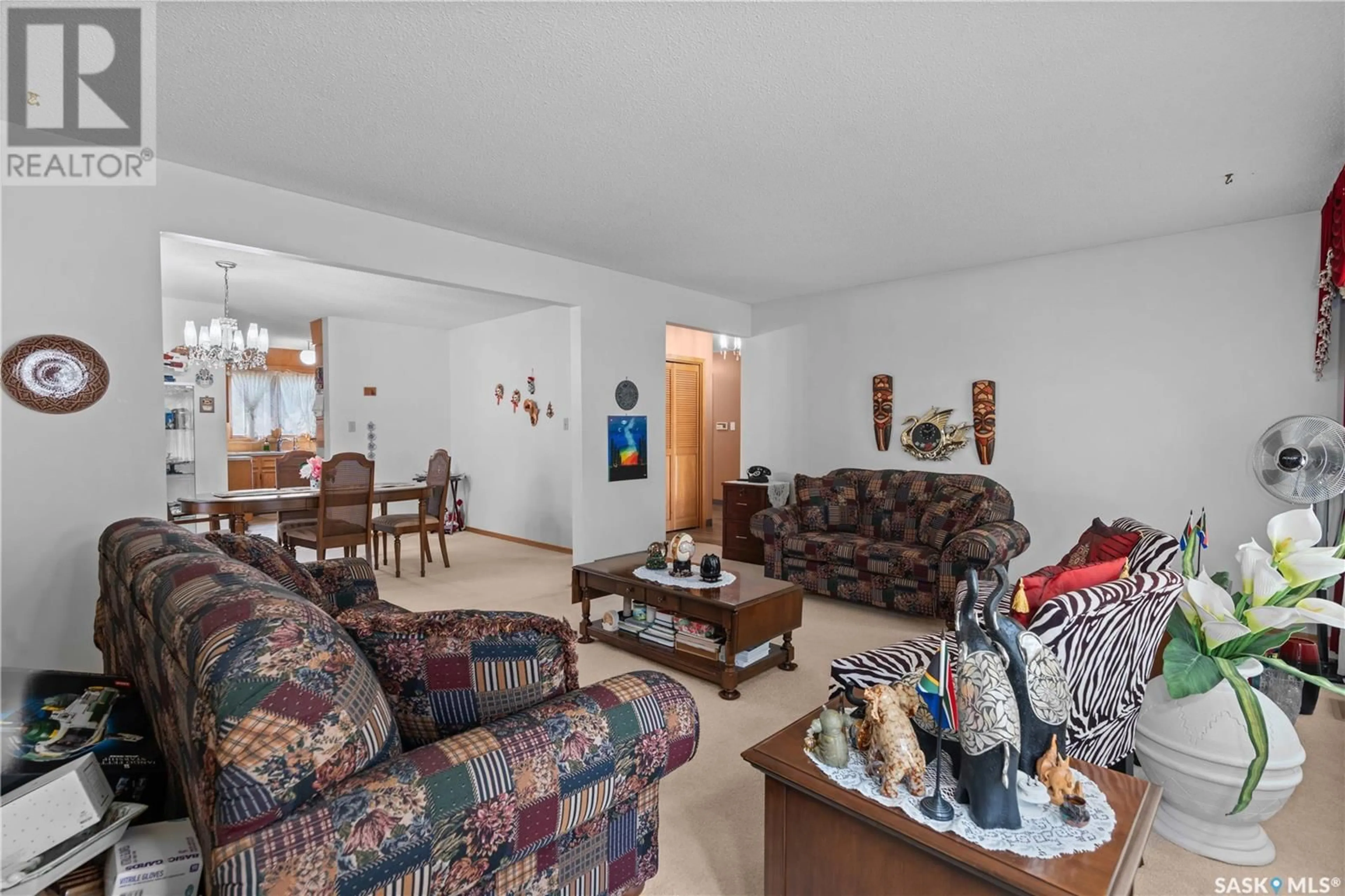 Living room with furniture, unknown for 27 GREEN MEADOW ROAD, Regina Saskatchewan S4V0A6