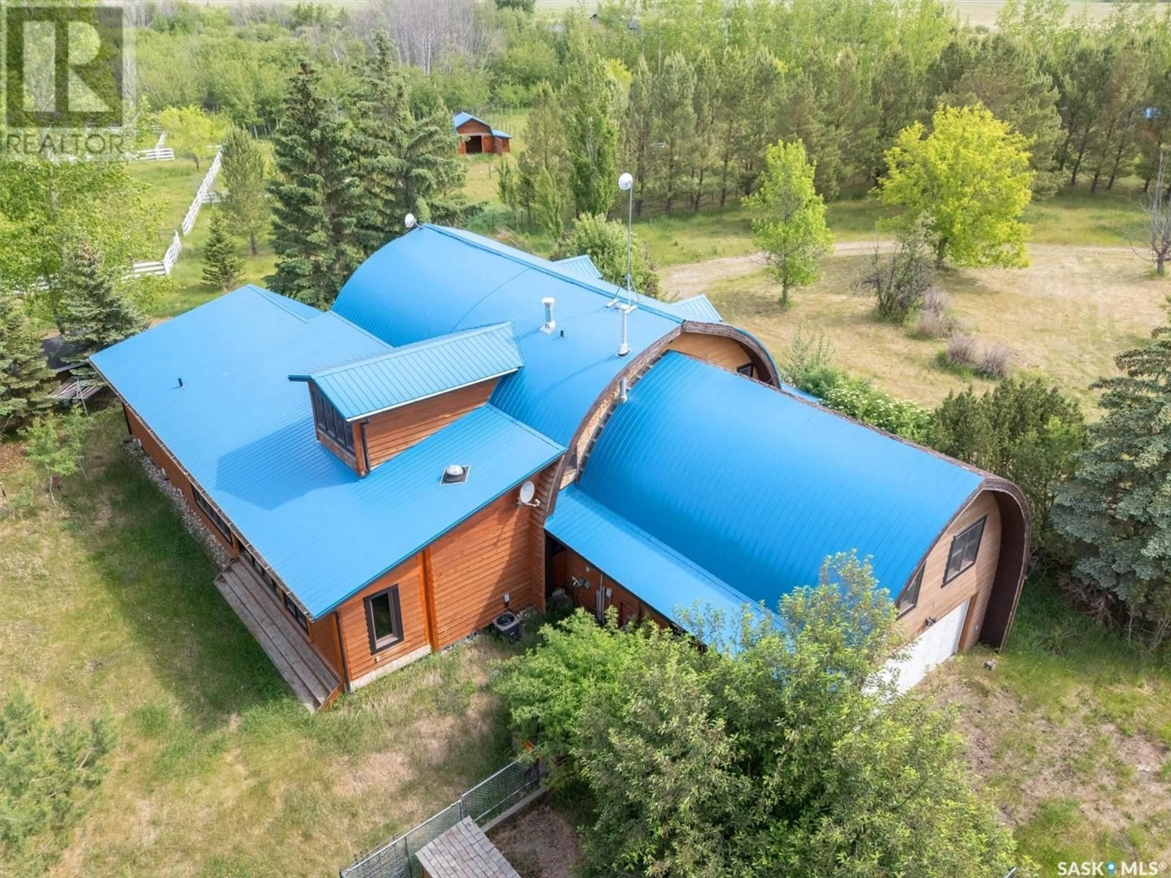 A pic from outside/outdoor area/front of a property/back of a property/a pic from drone, building for Equestrian - DAISY LANE, Blucher Rm No. 343 Saskatchewan S0K0Y0