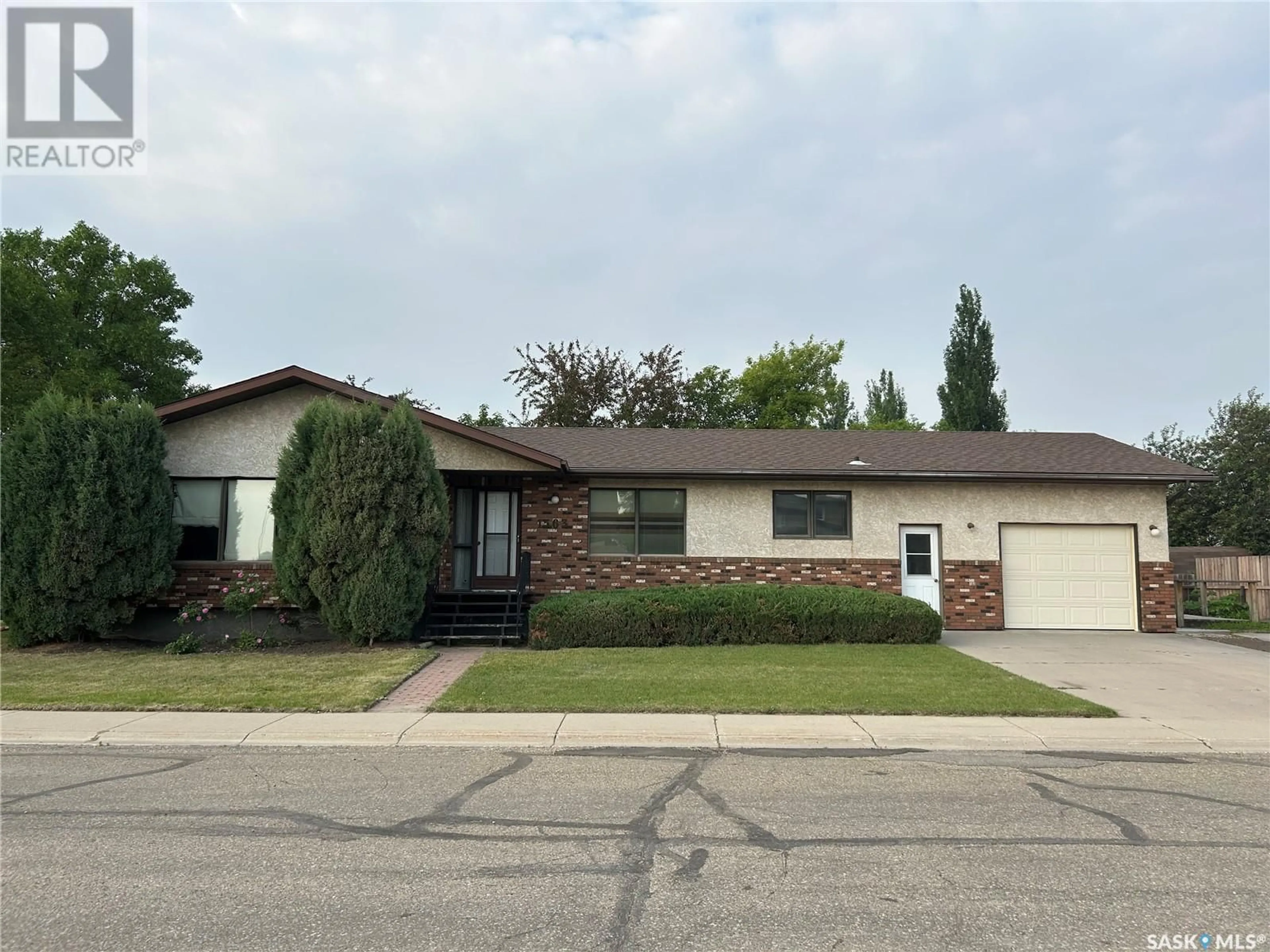 Home with vinyl exterior material, street for 1563 WAHLMEIER DRIVE, Estevan Saskatchewan S4A2M1