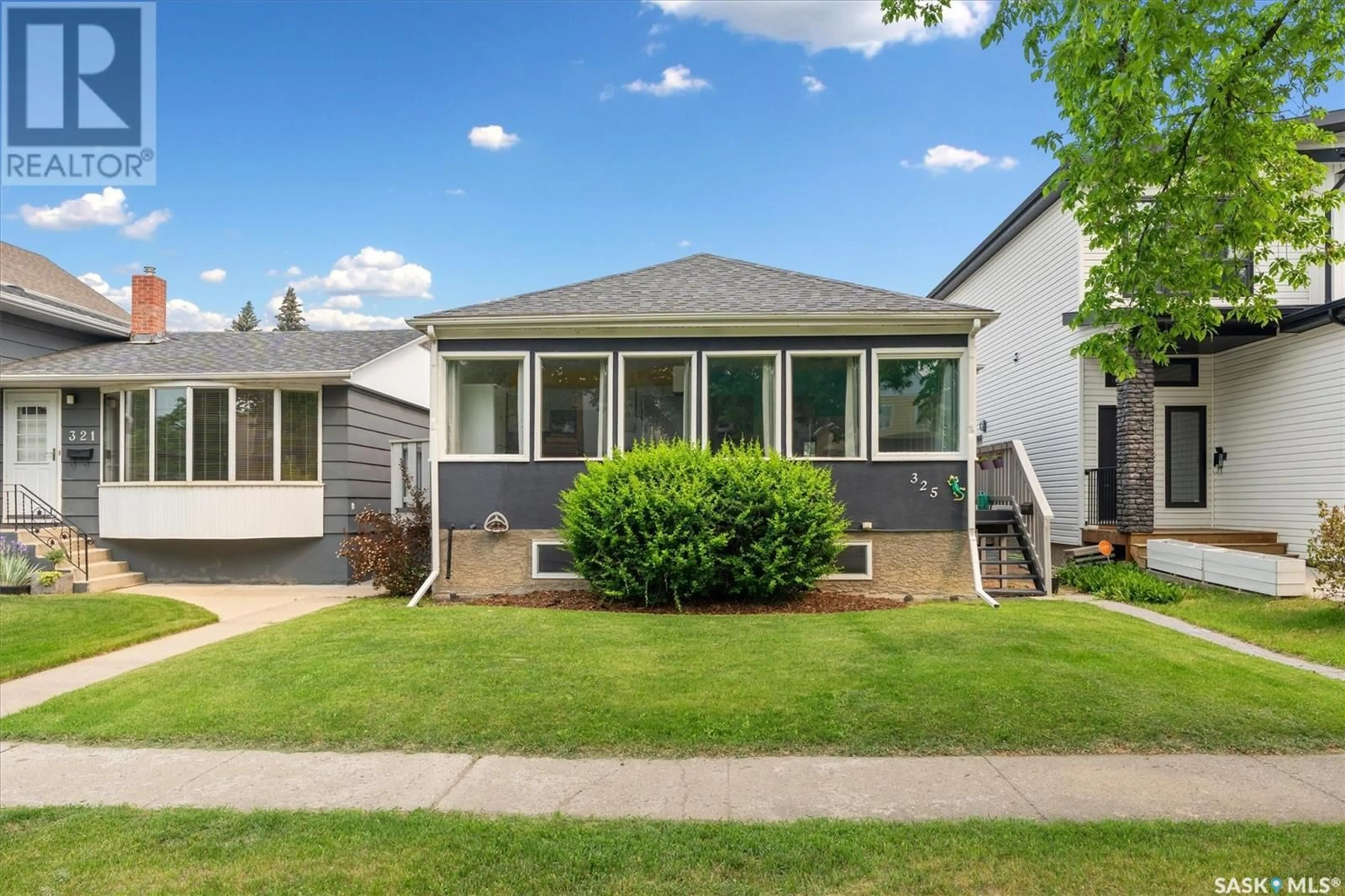 Home with vinyl exterior material, street for 325 2ND STREET, Saskatoon Saskatchewan S7H1N7