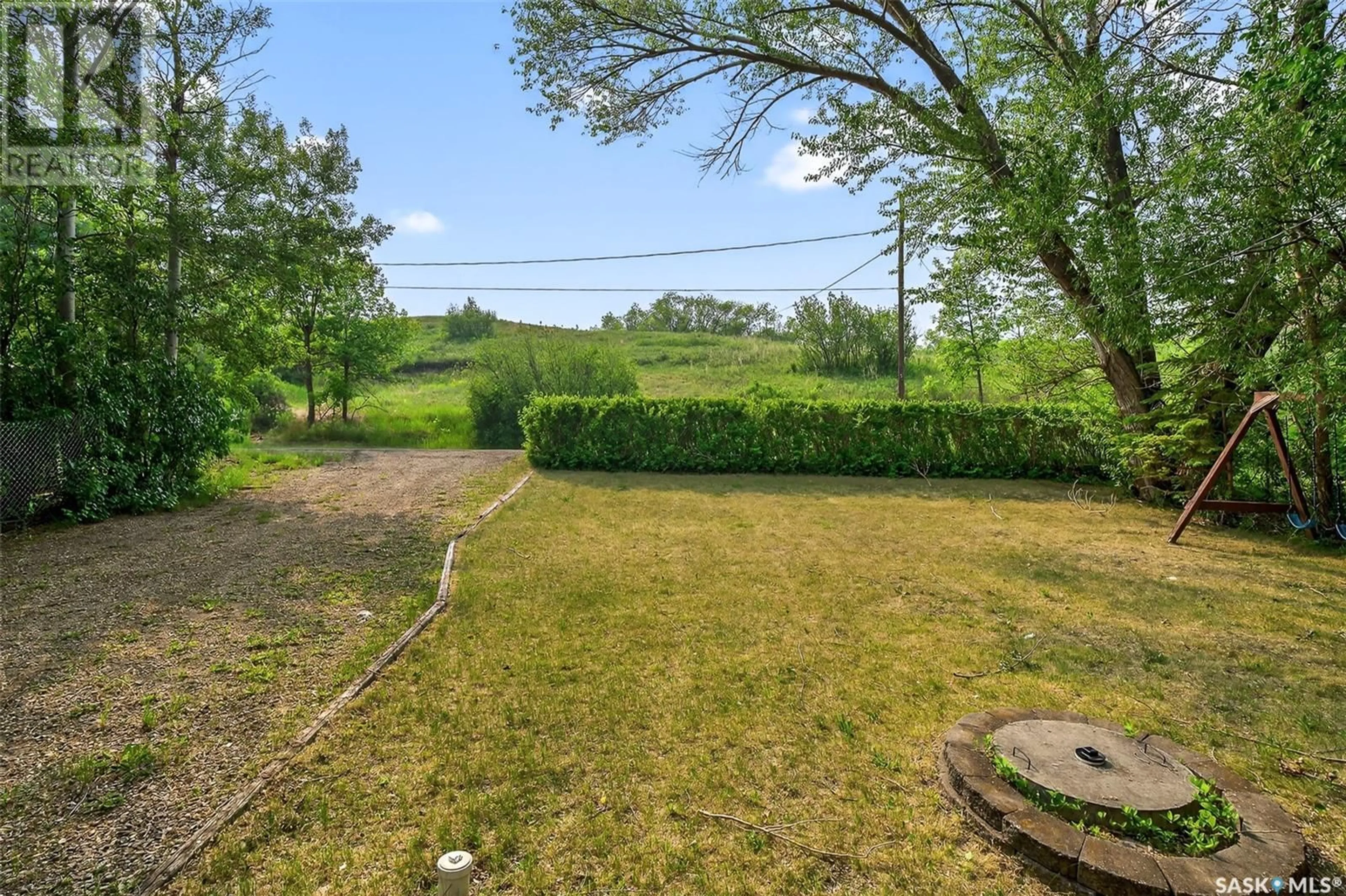 A pic from outside/outdoor area/front of a property/back of a property/a pic from drone, forest/trees view for 3 ELLIOTT DRIVE, Sun Valley Saskatchewan S6H7W6