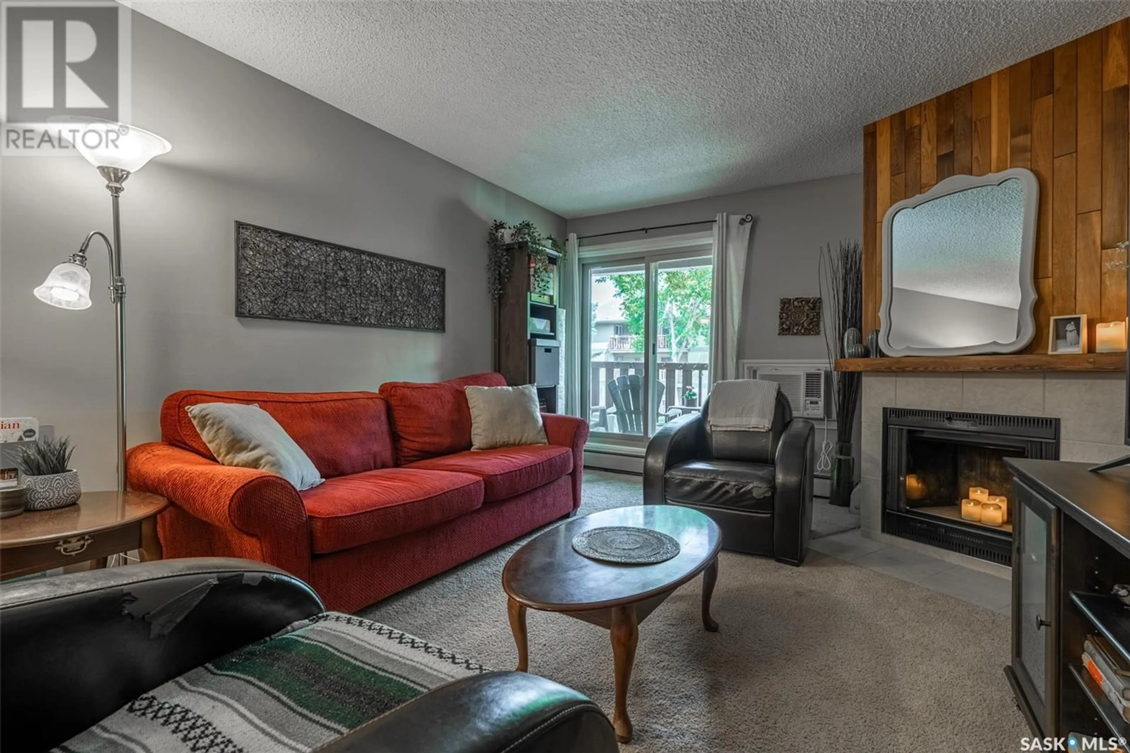 Living room with furniture, unknown for 204B - 1121 MCKERCHER DRIVE, Saskatoon Saskatchewan S7H5B8