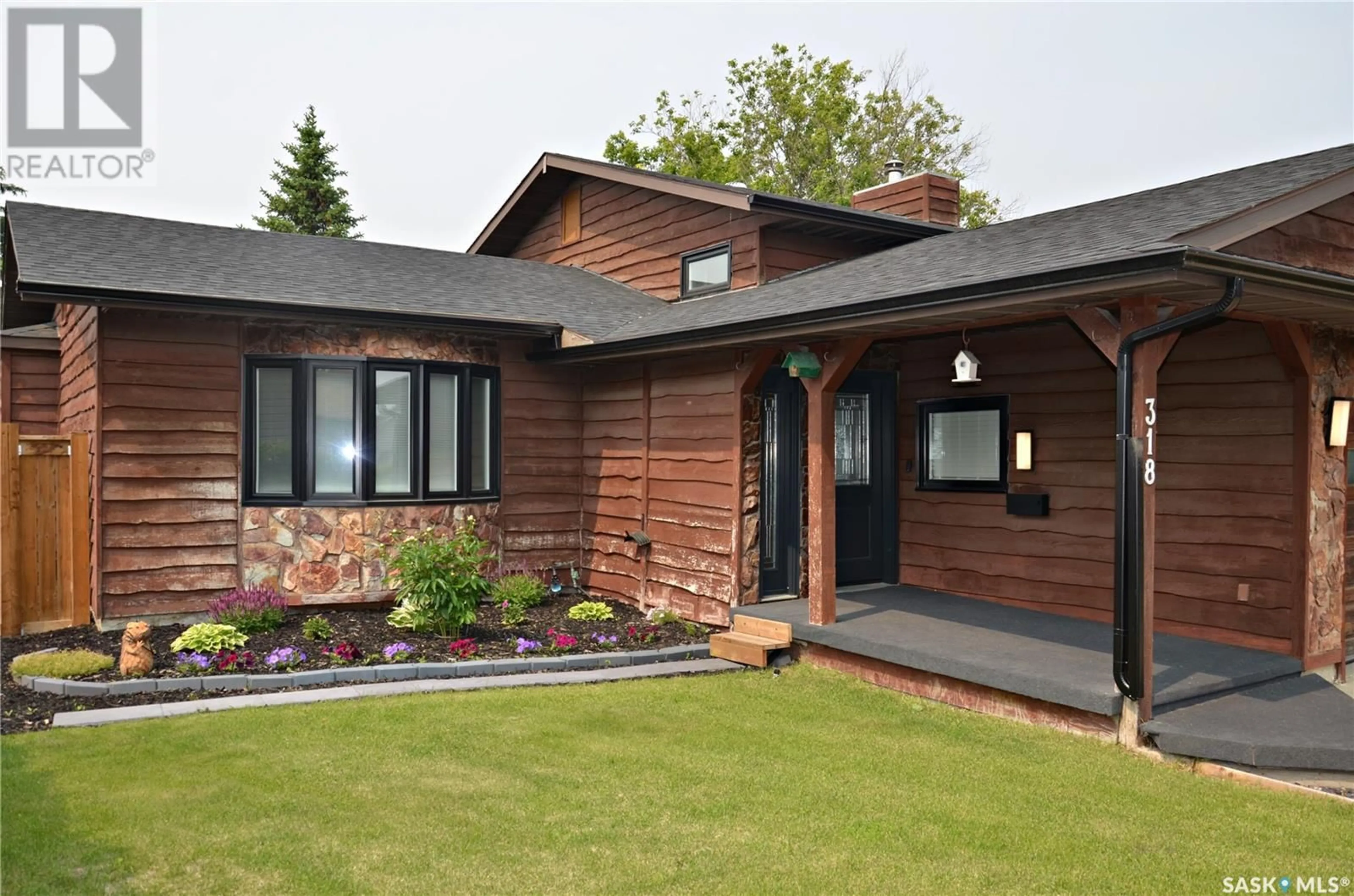 Home with brick exterior material, street for 318 DELAYEN CRESCENT, Saskatoon Saskatchewan S7N2V2