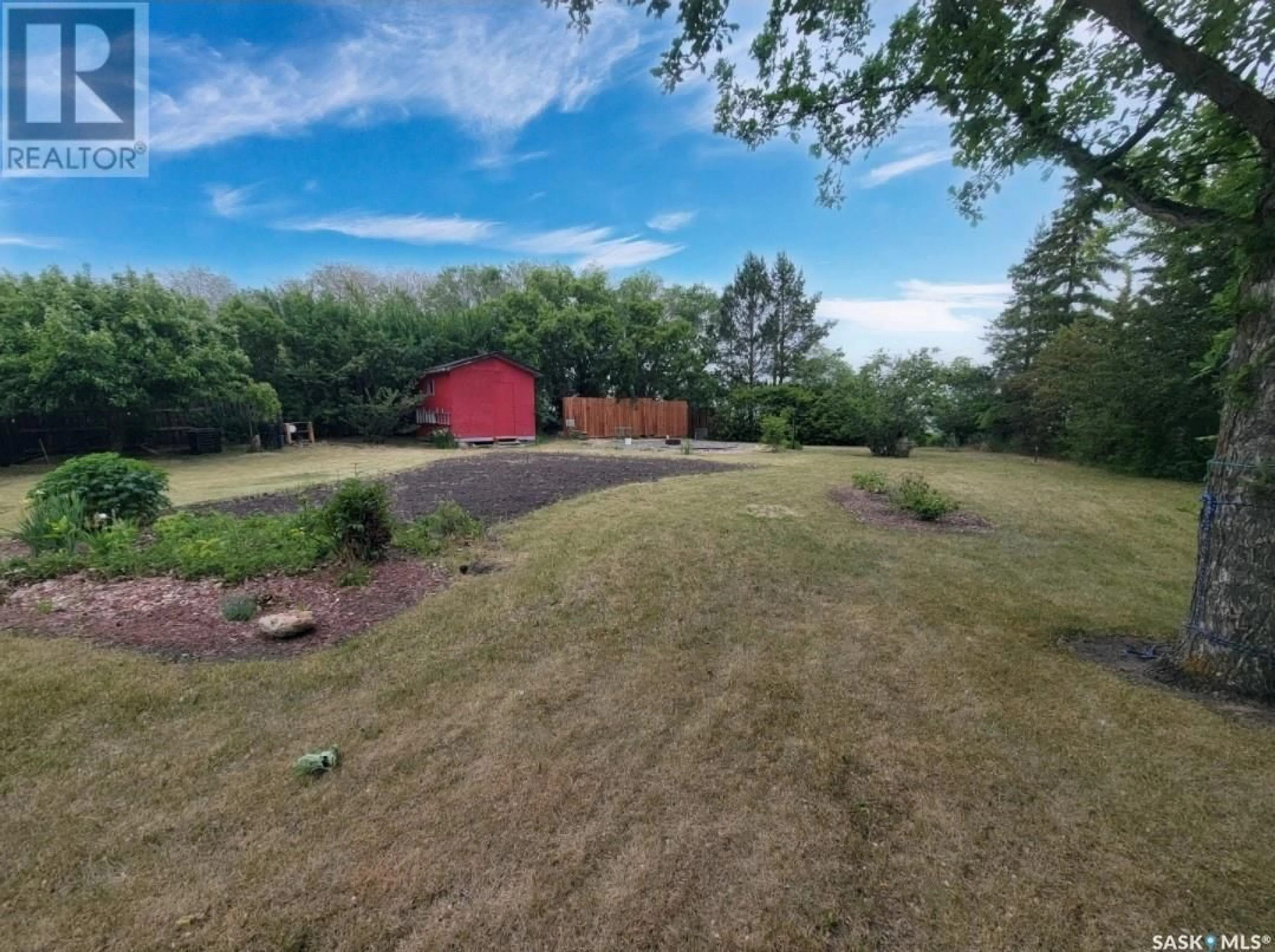 A pic from outside/outdoor area/front of a property/back of a property/a pic from drone, water/lake/river/ocean view for 122 4TH AVENUE, Neilburg Saskatchewan S0M2C0