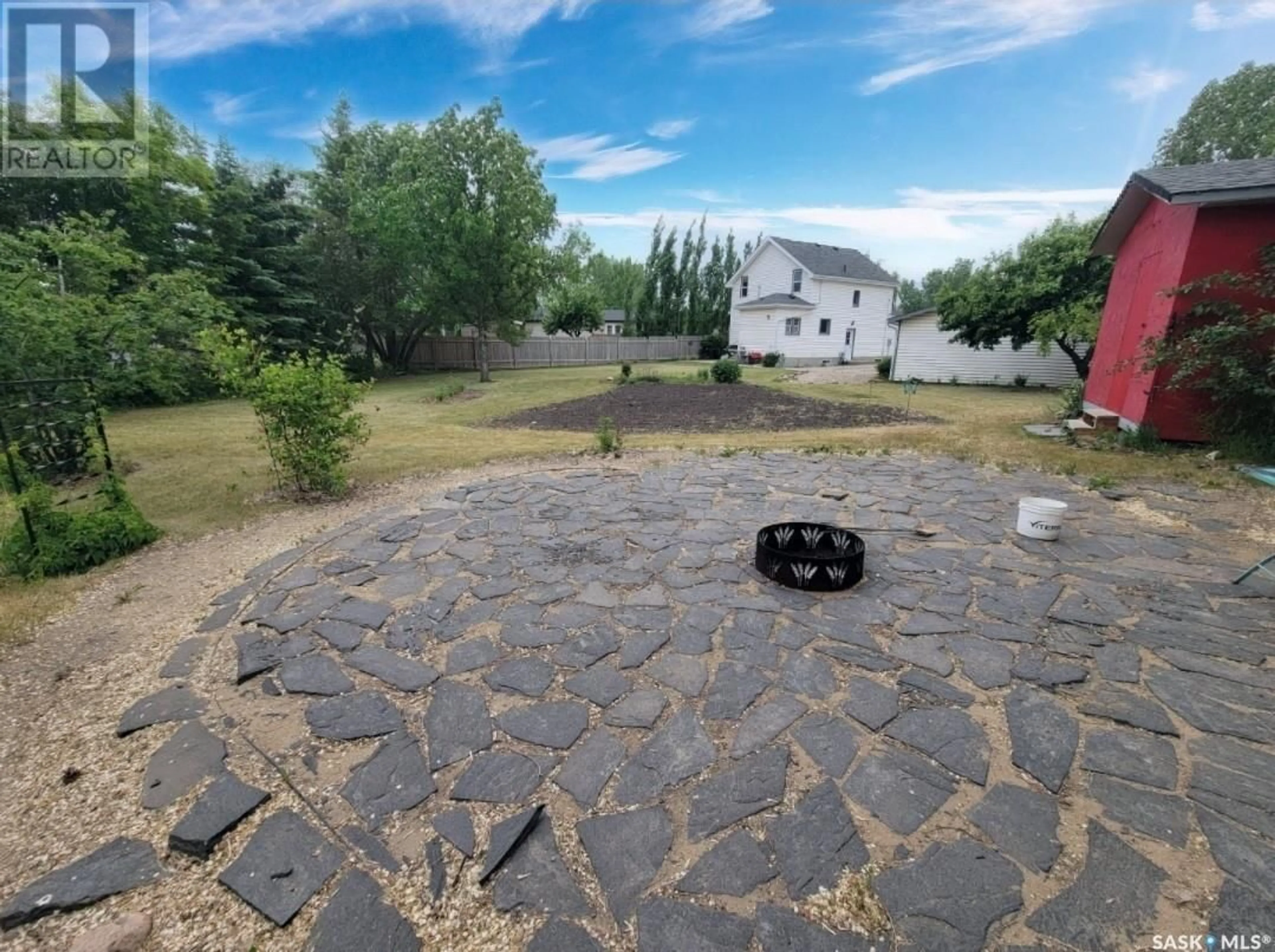 A pic from outside/outdoor area/front of a property/back of a property/a pic from drone, unknown for 122 4TH AVENUE, Neilburg Saskatchewan S0M2C0