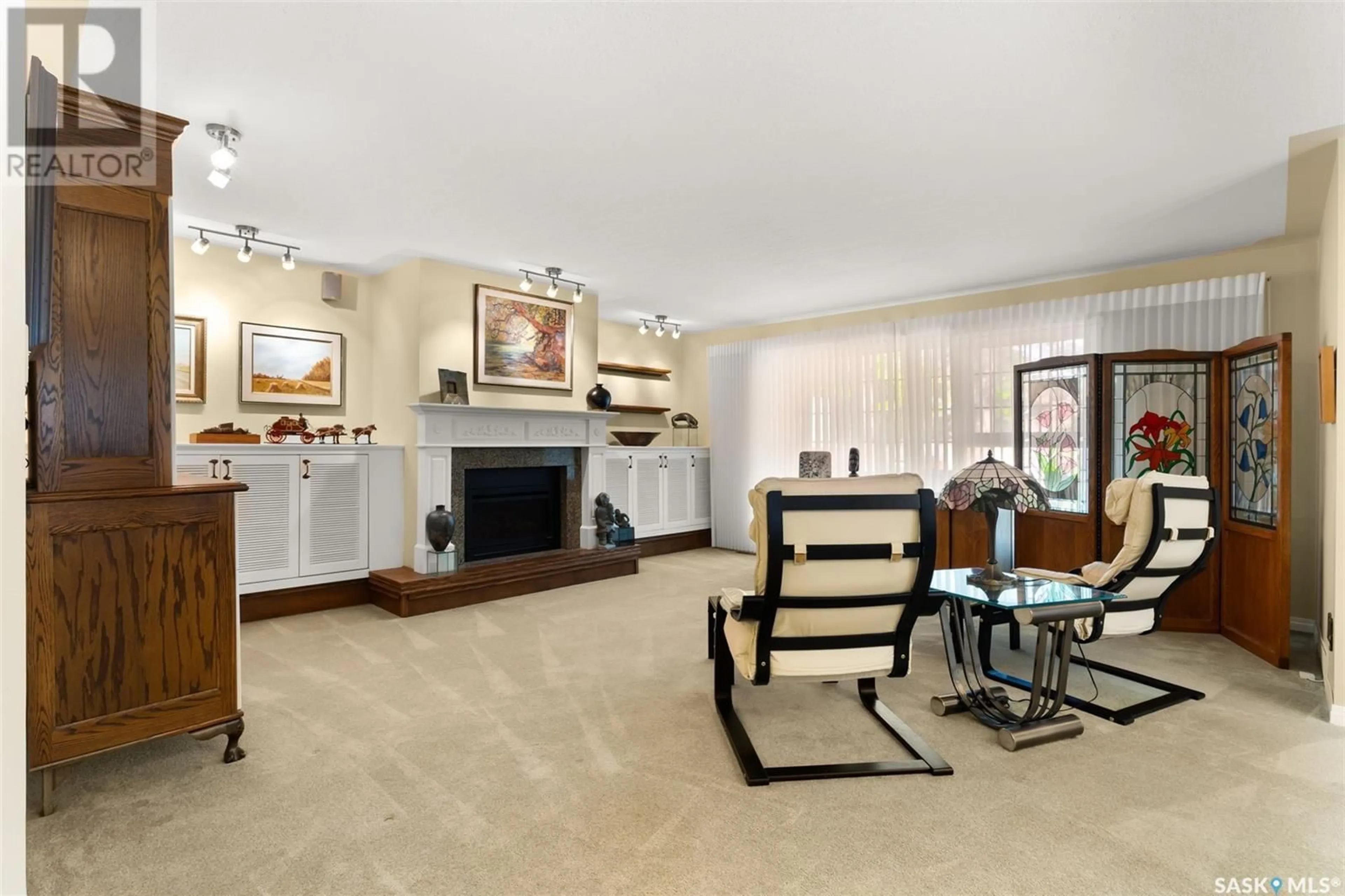 Living room with furniture, unknown for 1052 - 54 GRYPHONS WALK, Regina Saskatchewan S4S6X1