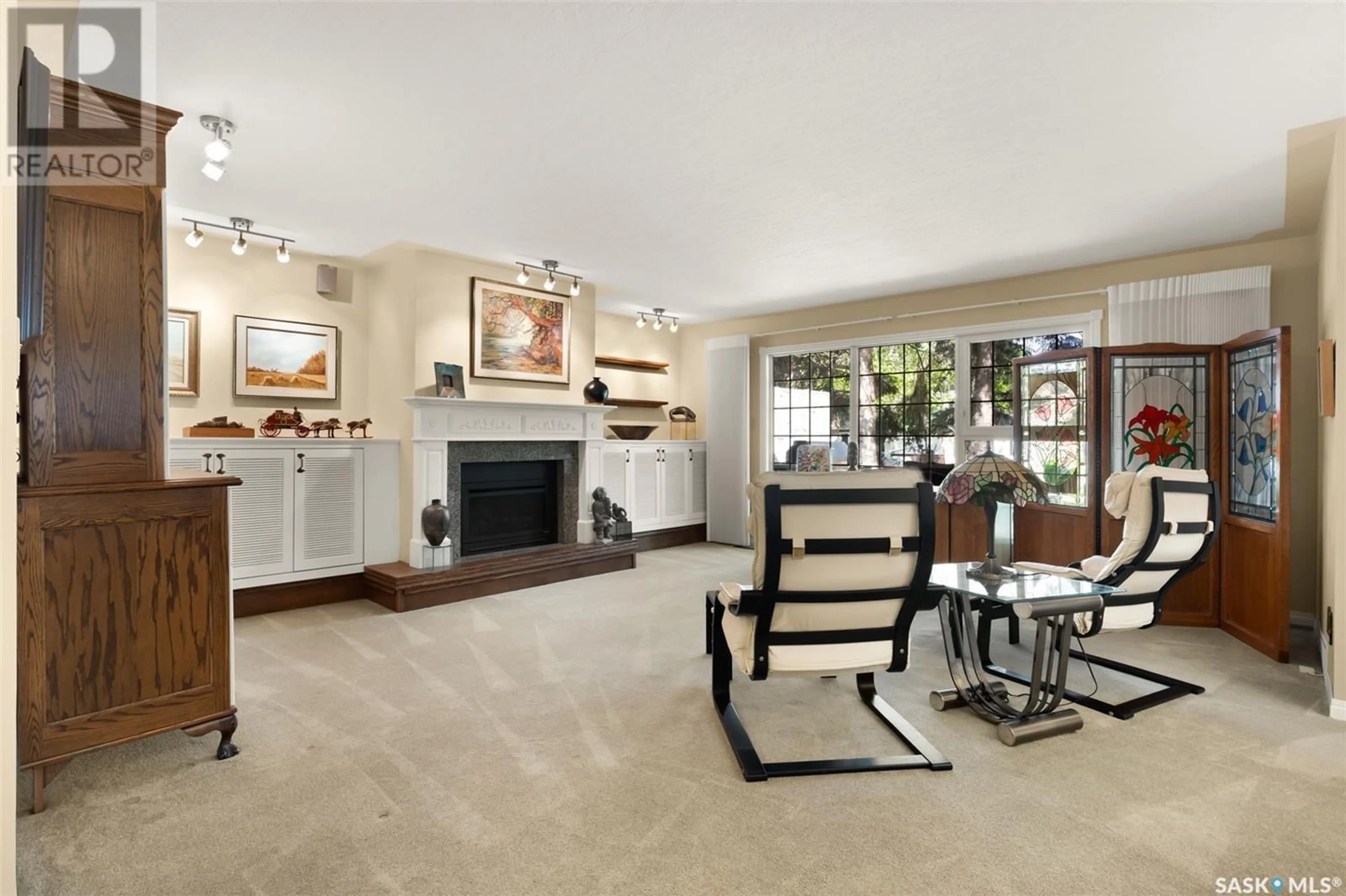 Living room with furniture, ceramic/tile floor for 1052 - 54 GRYPHONS WALK, Regina Saskatchewan S4S6X1