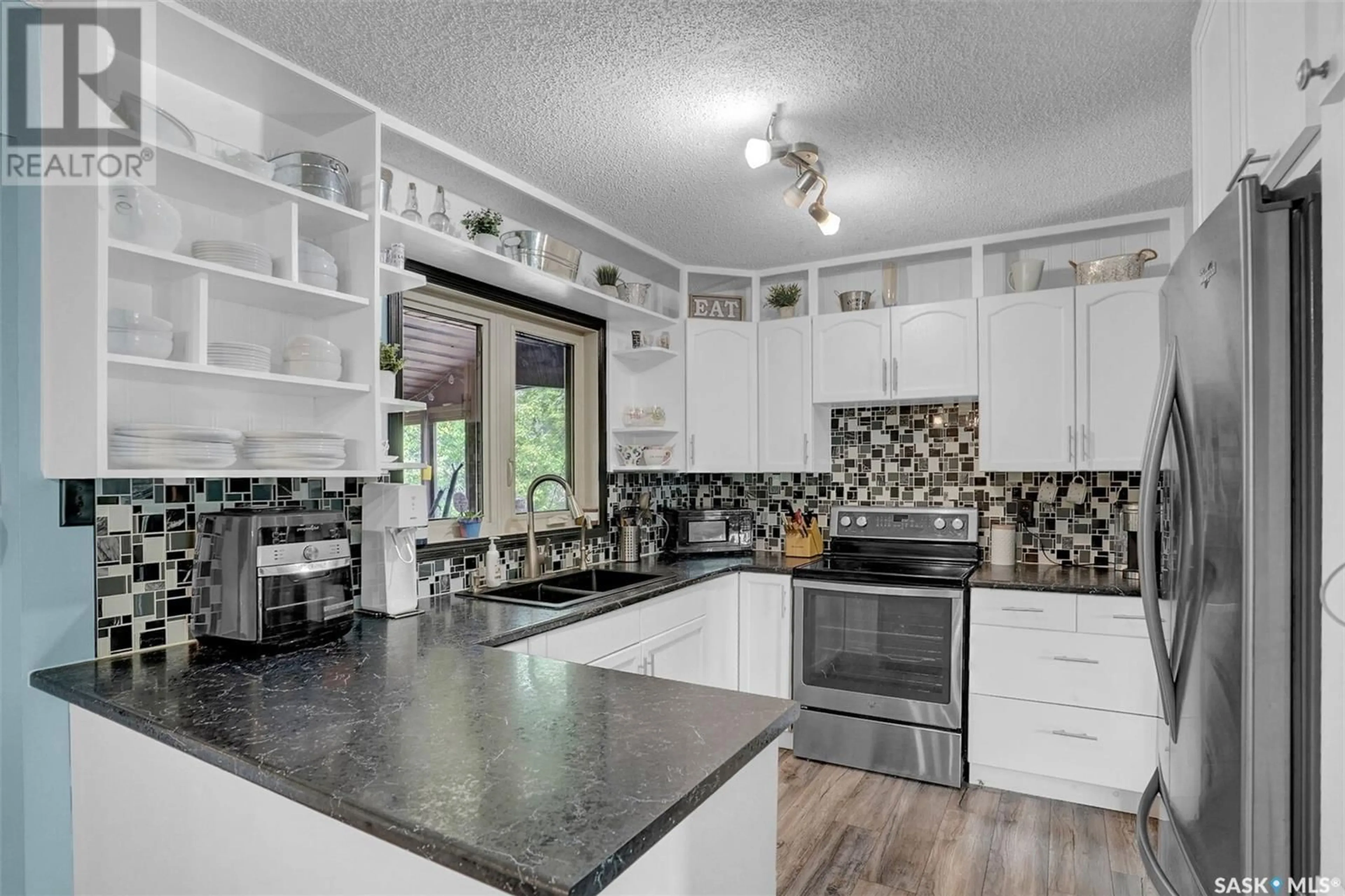 Open concept kitchen, ceramic/tile floor for 3422 7TH AVENUE, Regina Saskatchewan S4N7A6