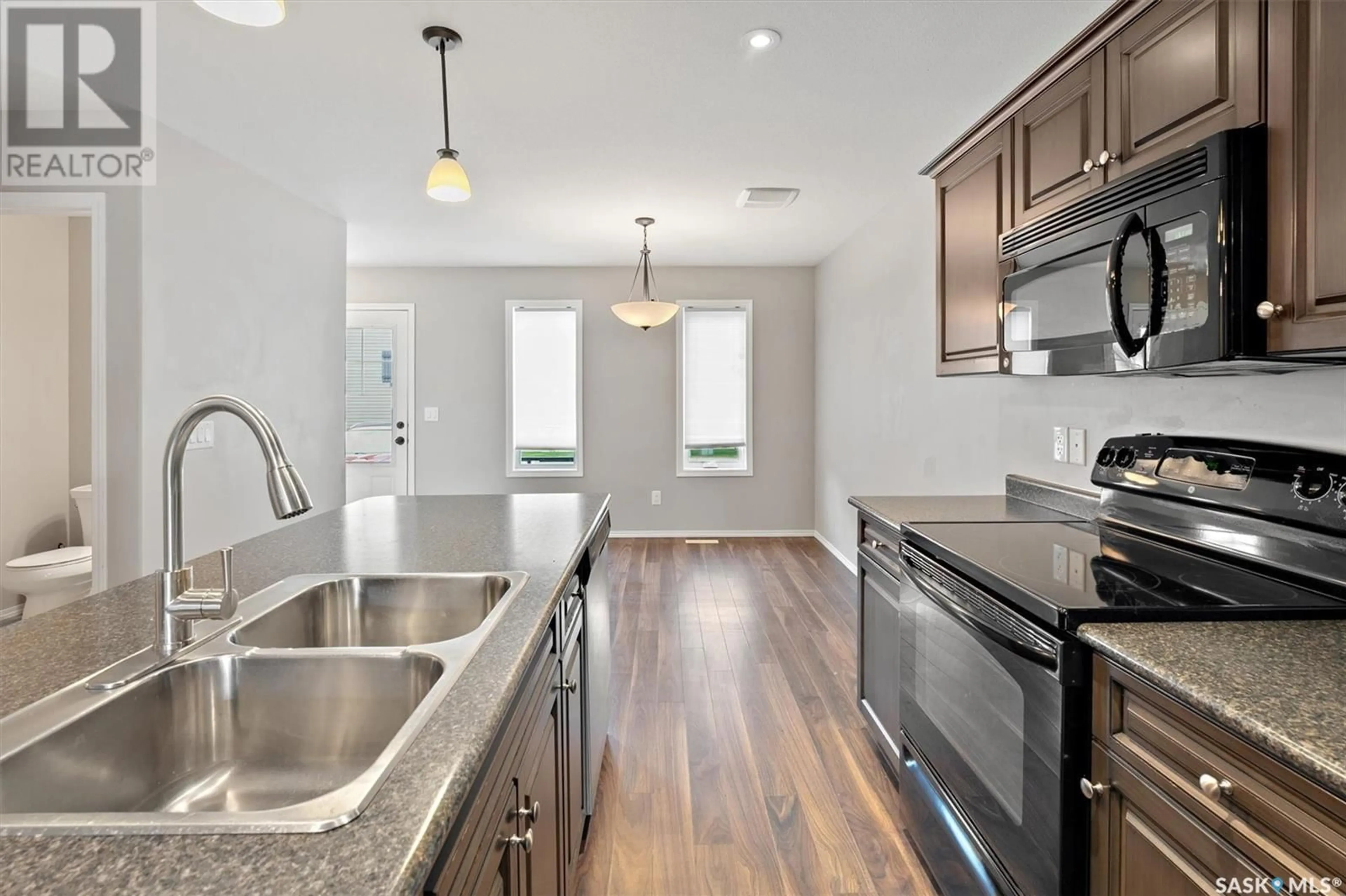 Open concept kitchen, unknown for 212 LANGLOIS WAY, Saskatoon Saskatchewan S7T0L2