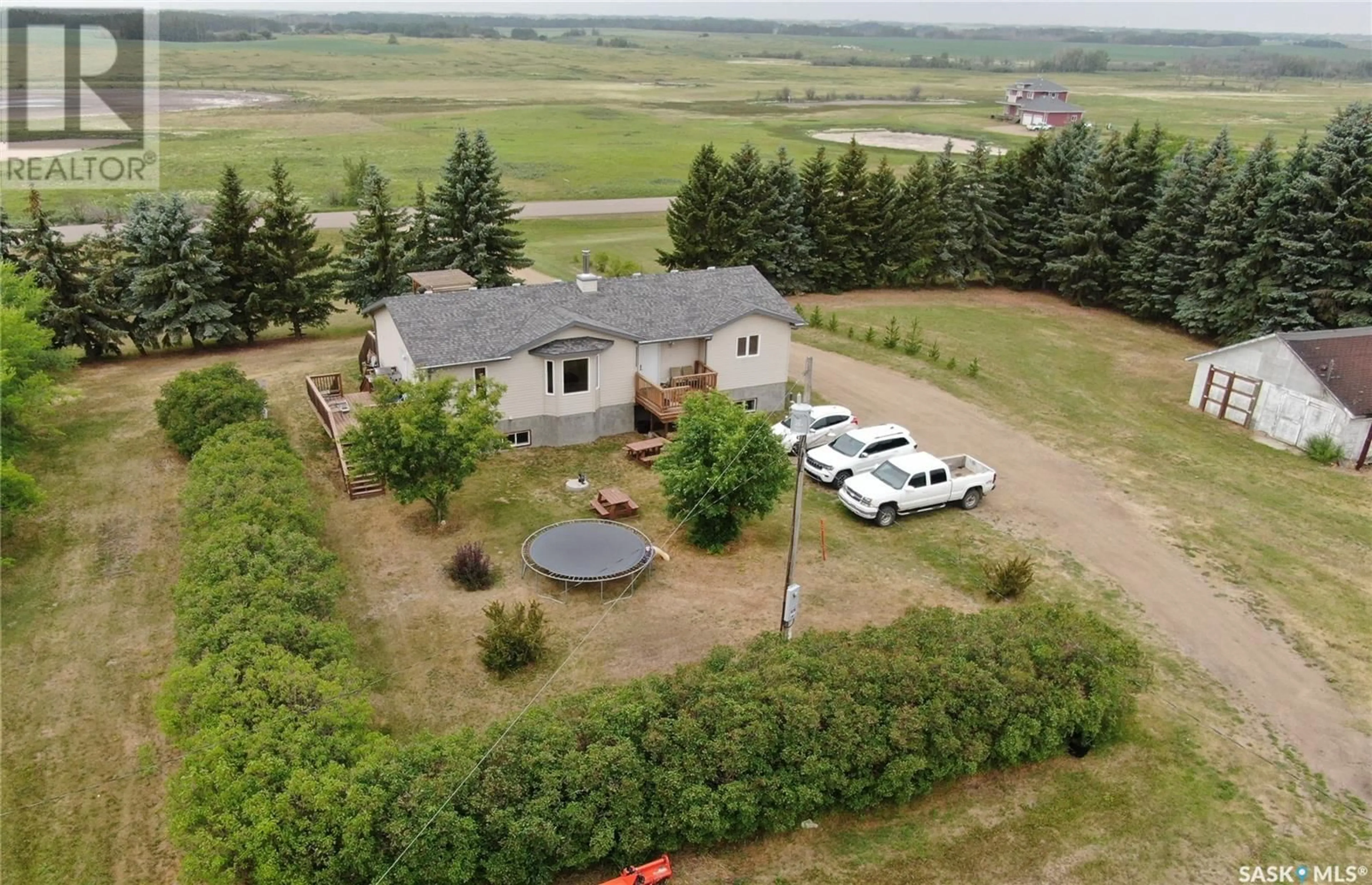 A pic from outside/outdoor area/front of a property/back of a property/a pic from drone, water/lake/river/ocean view for 26917 GRID 688, Wilton Rm No. 472 Saskatchewan S0M1R0