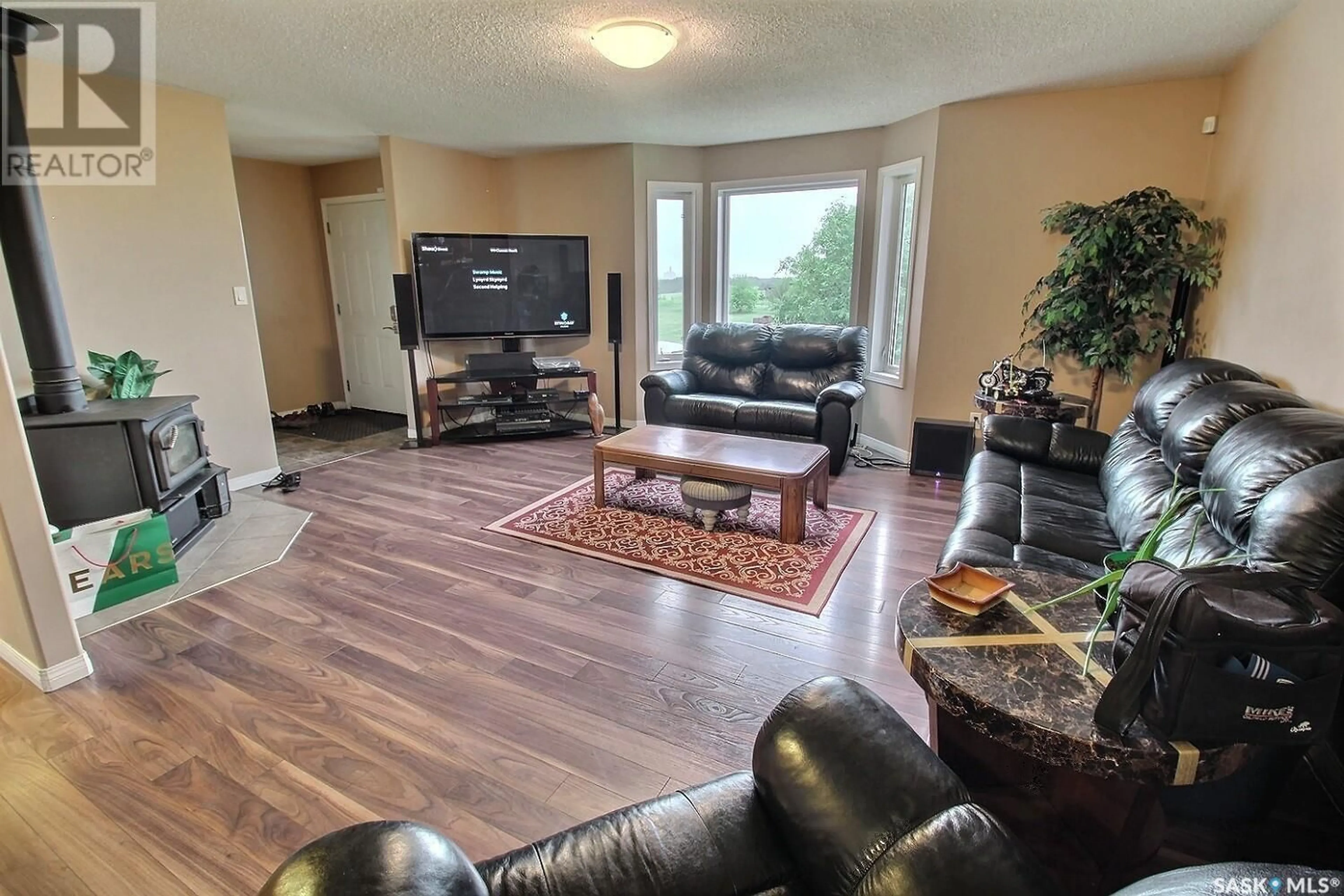 Living room with furniture, unknown for 26917 GRID 688, Wilton Rm No. 472 Saskatchewan S0M1R0