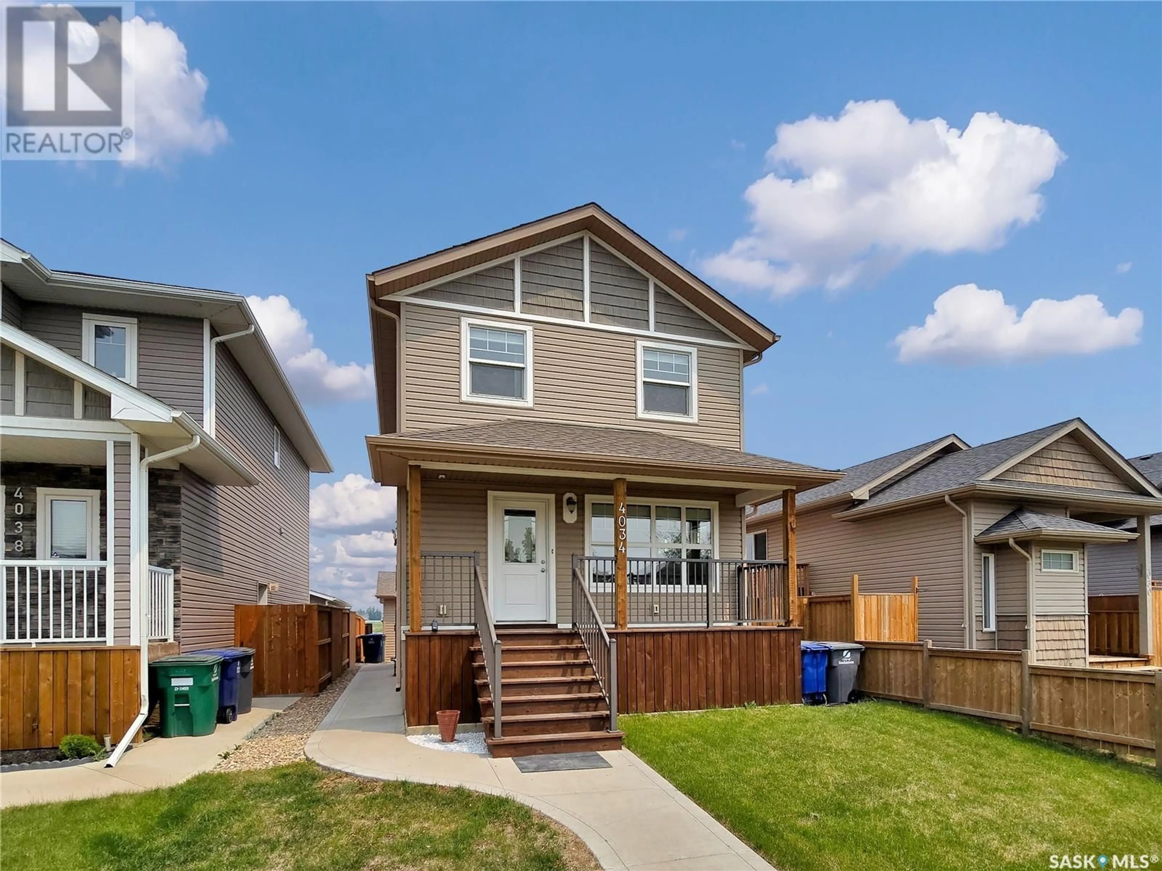 Home with vinyl exterior material, street for 4034 33RD STREET, Saskatoon Saskatchewan S7L7N2