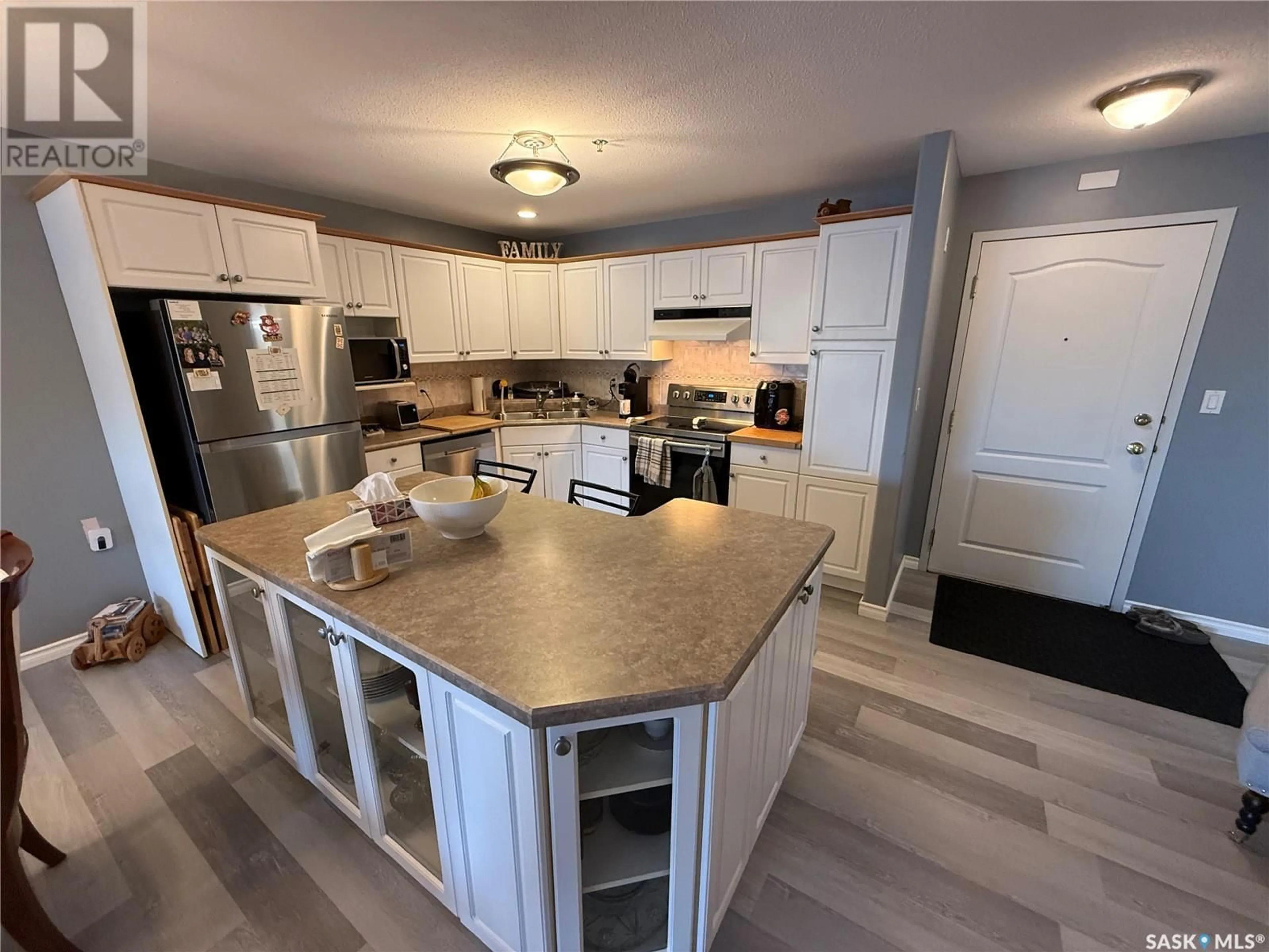 Open concept kitchen, ceramic/tile floor for 205 - 304 MCINTYRE STREET, Regina Saskatchewan S4R3B7