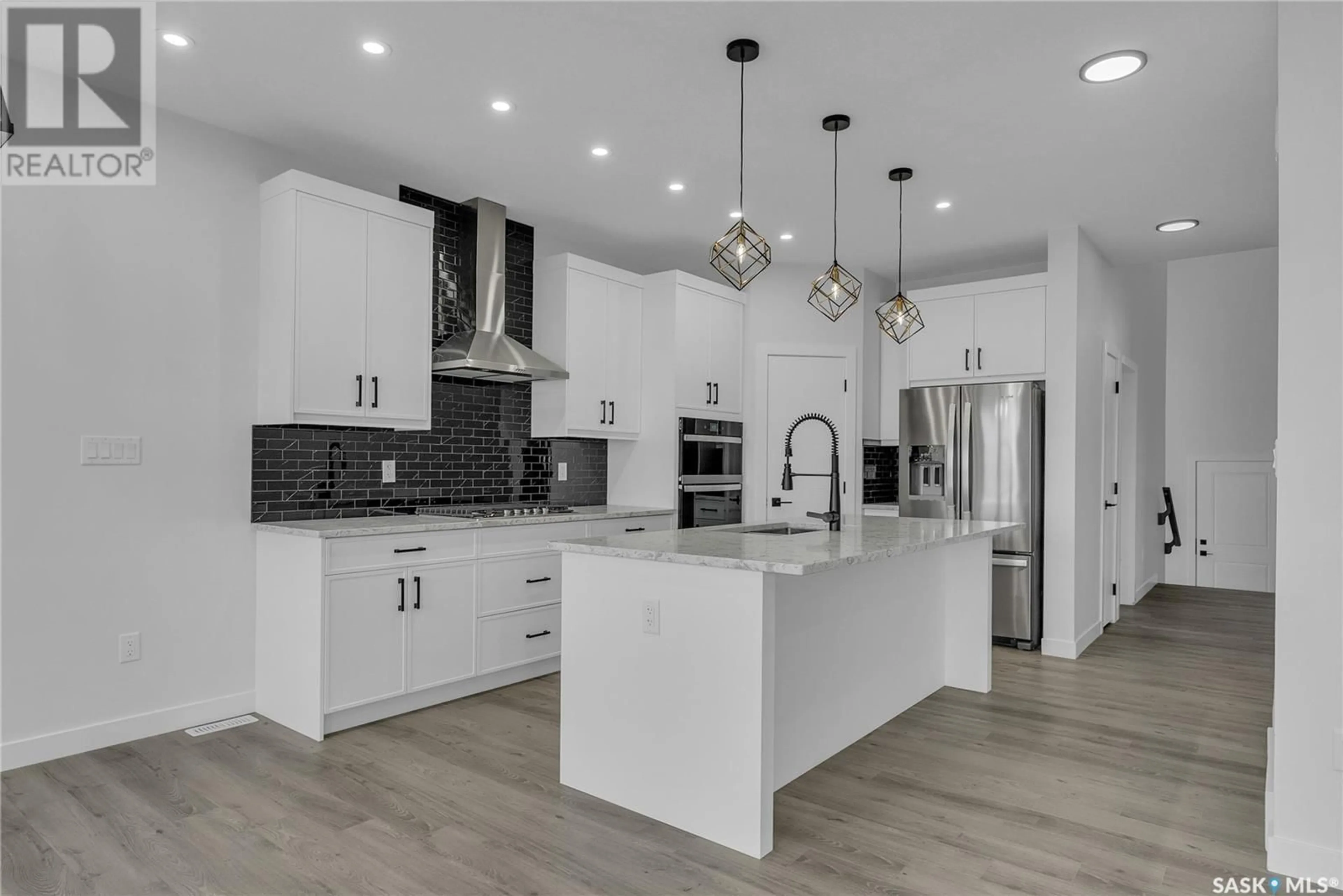 Open concept kitchen, ceramic/tile floor for 379 SHARMA CRESCENT, Saskatoon Saskatchewan S7W1K8