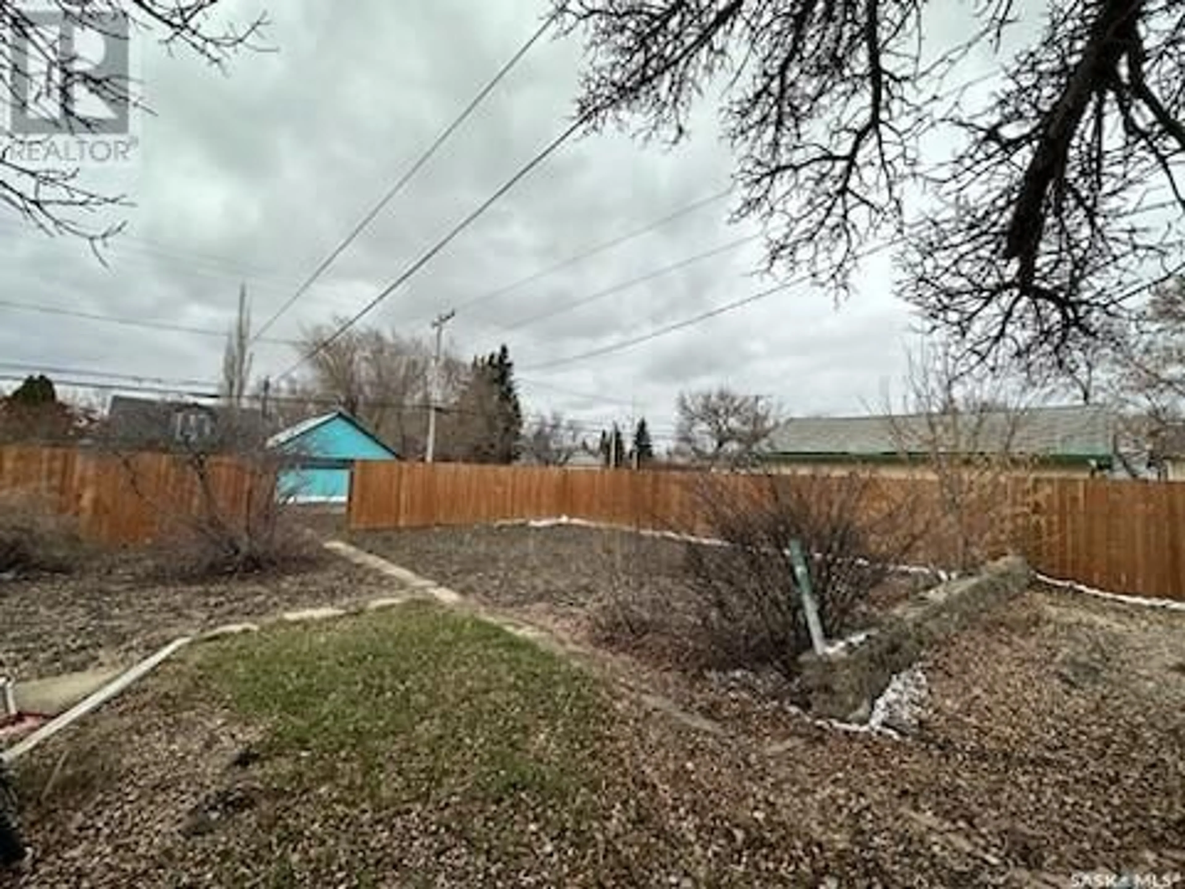 A pic from outside/outdoor area/front of a property/back of a property/a pic from drone, unknown for 215 4TH AVENUE, Kindersley Saskatchewan S0L1S0