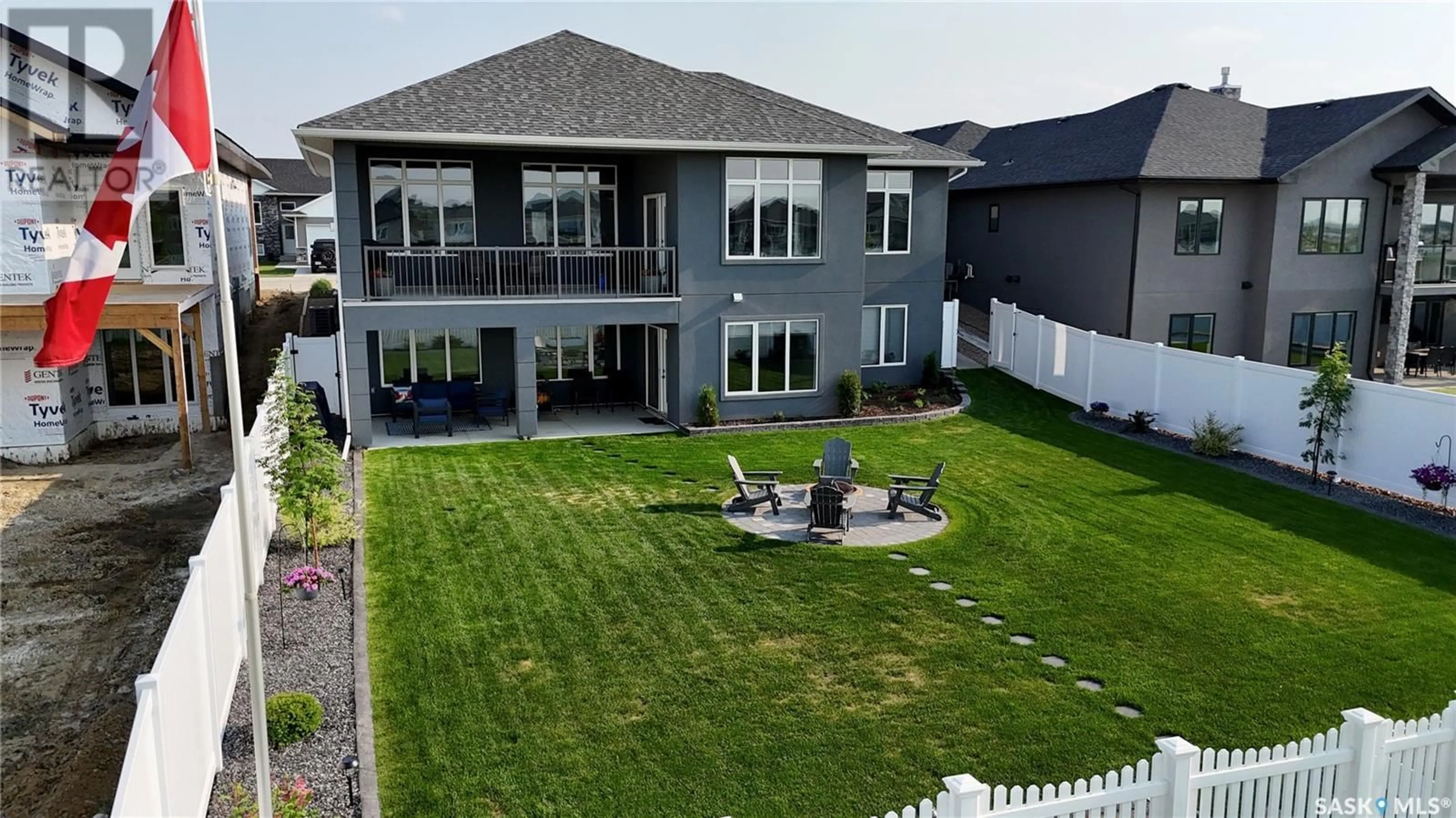 A pic from outside/outdoor area/front of a property/back of a property/a pic from drone, unknown for 711 WEIR CRESCENT, Warman Saskatchewan S0K4S4