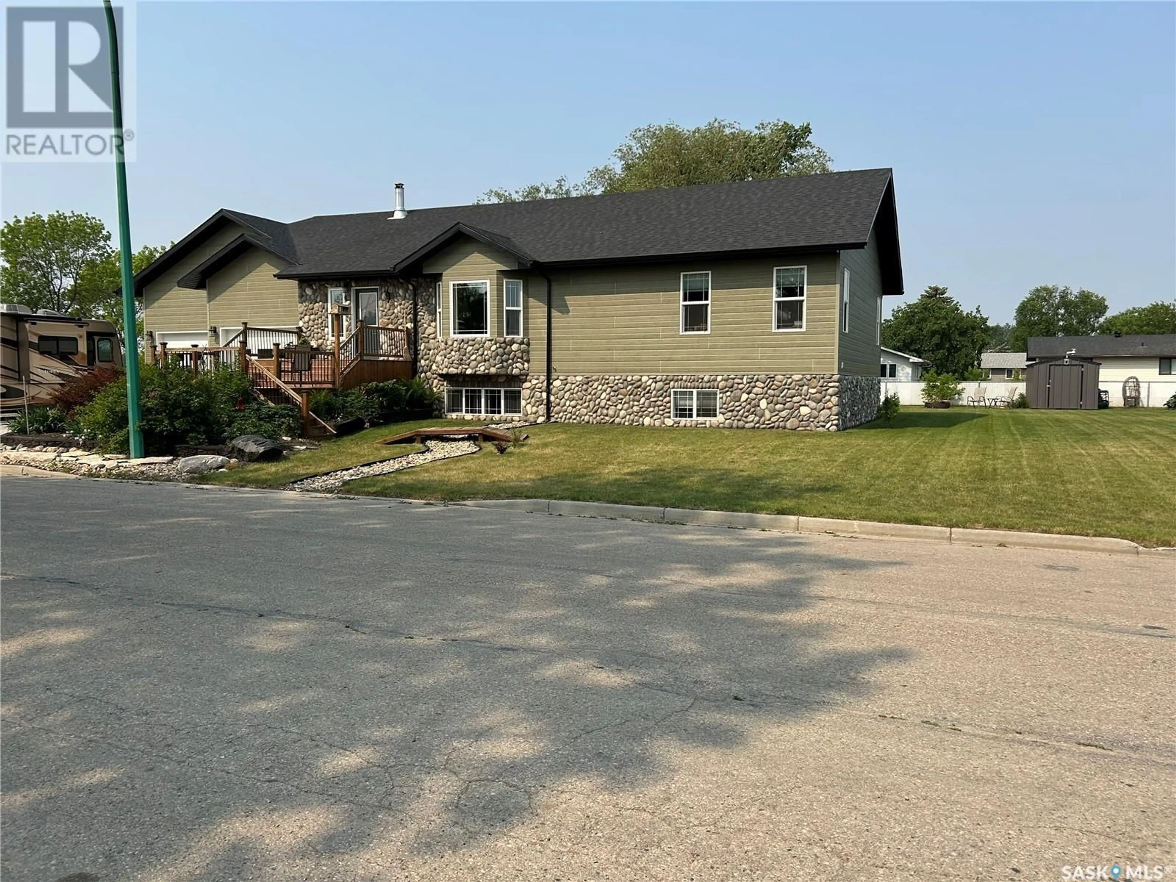 Home with vinyl exterior material, street for 455 4TH STREET, Carrot River Saskatchewan S0E0L0