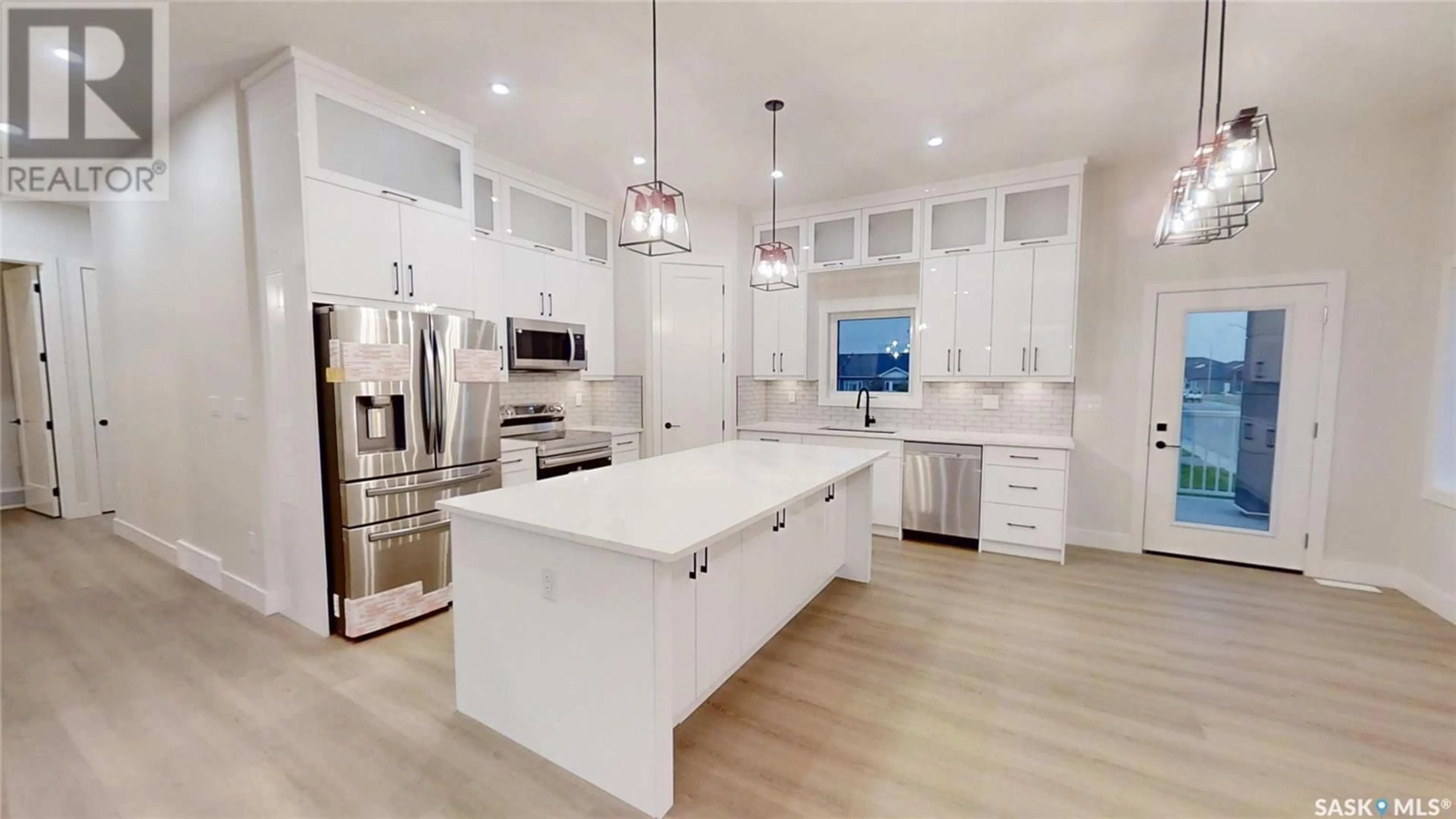Open concept kitchen, ceramic/tile floor for 501 JONES CRESCENT, Warman Saskatchewan S0K4S4