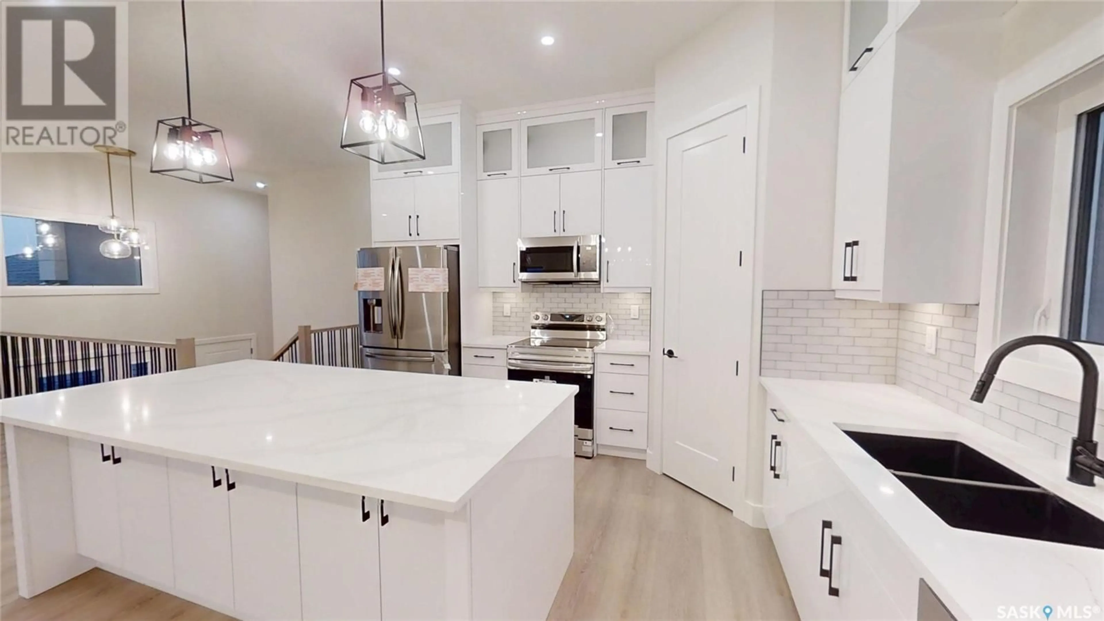 Open concept kitchen, ceramic/tile floor for 501 JONES CRESCENT, Warman Saskatchewan S0K4S4
