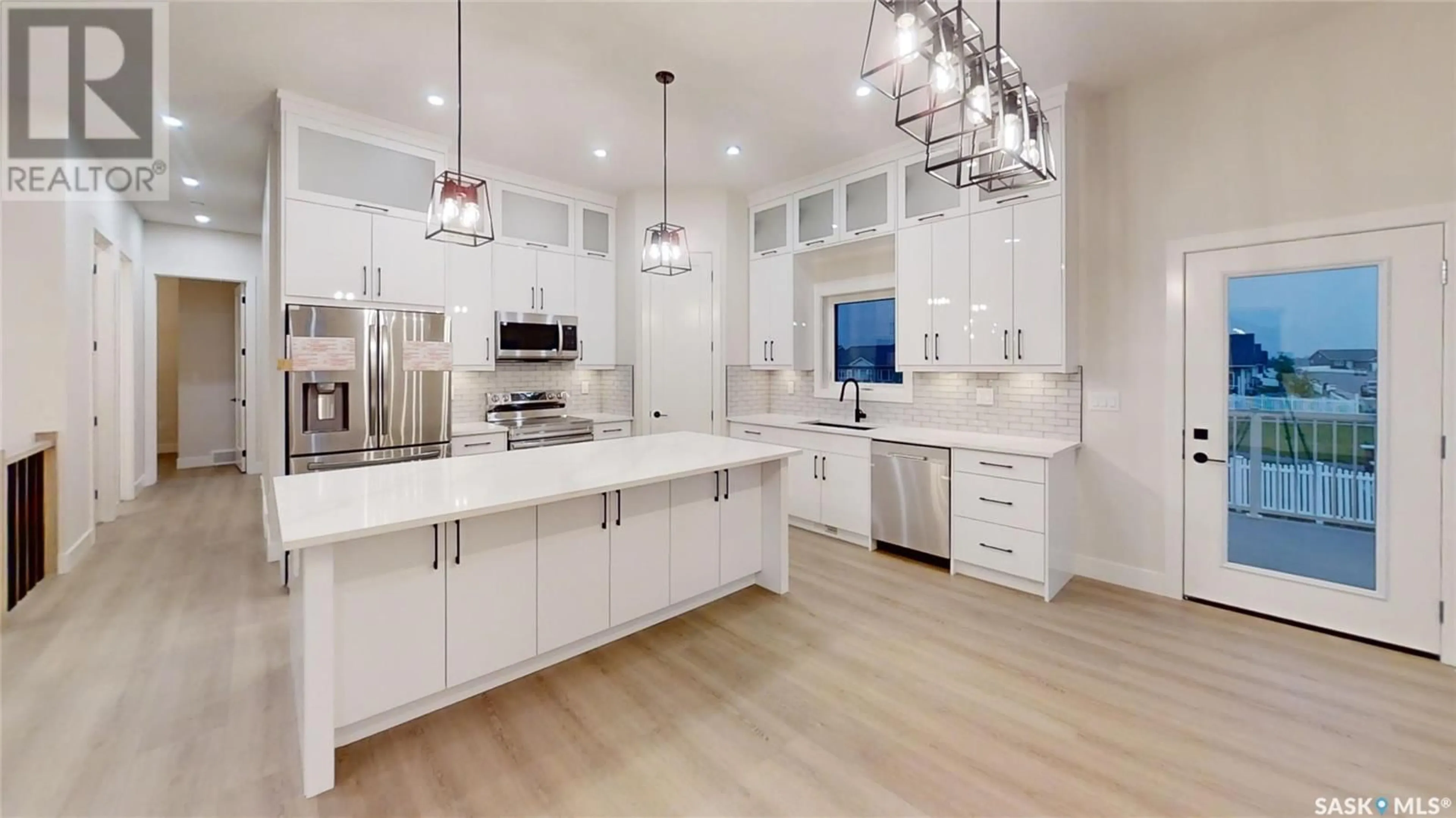 Open concept kitchen, unknown for 501 JONES CRESCENT, Warman Saskatchewan S0K4S4