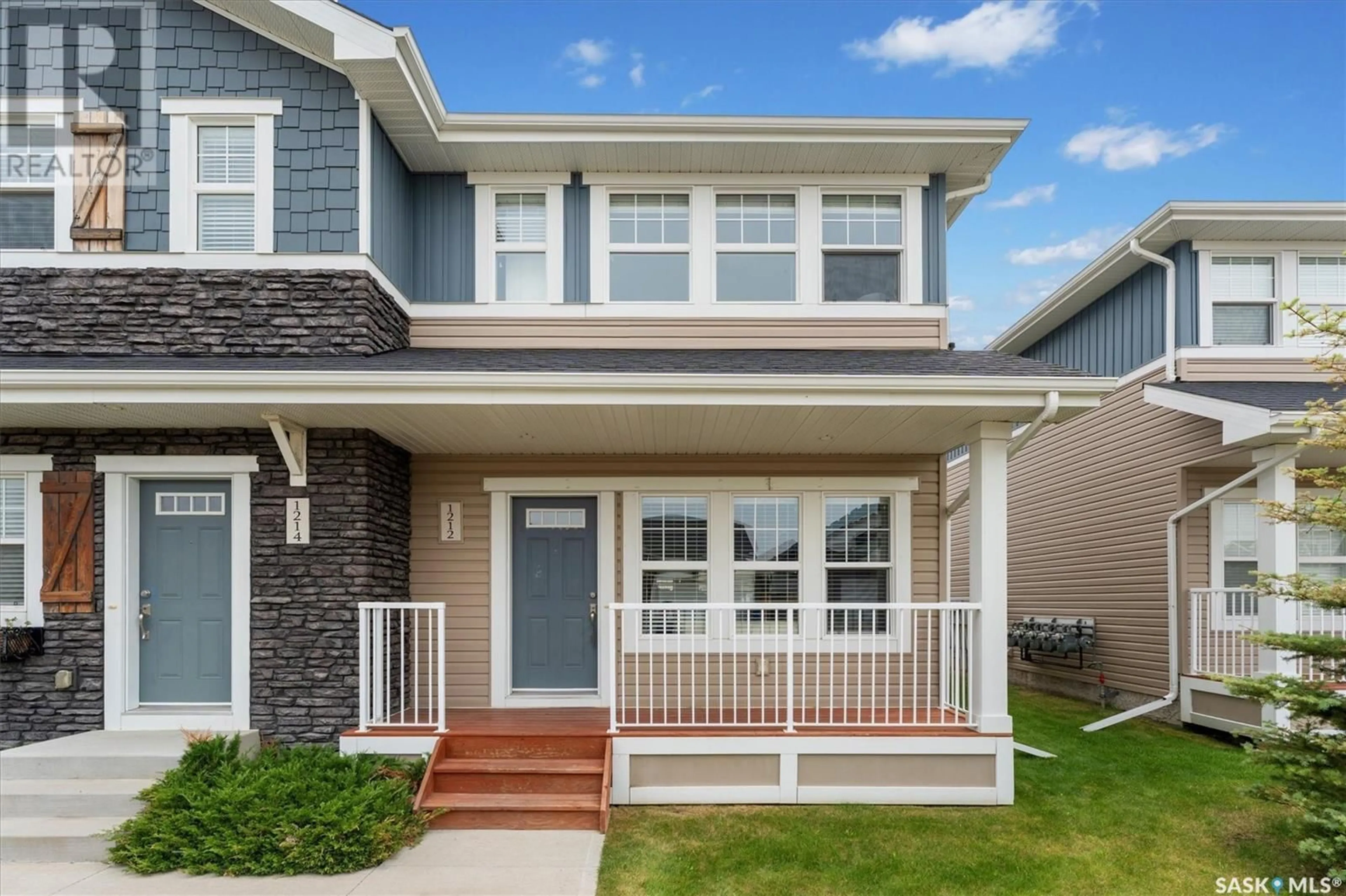 Home with vinyl exterior material, street for 1212 PRINGLE WAY, Saskatoon Saskatchewan S7T0X5