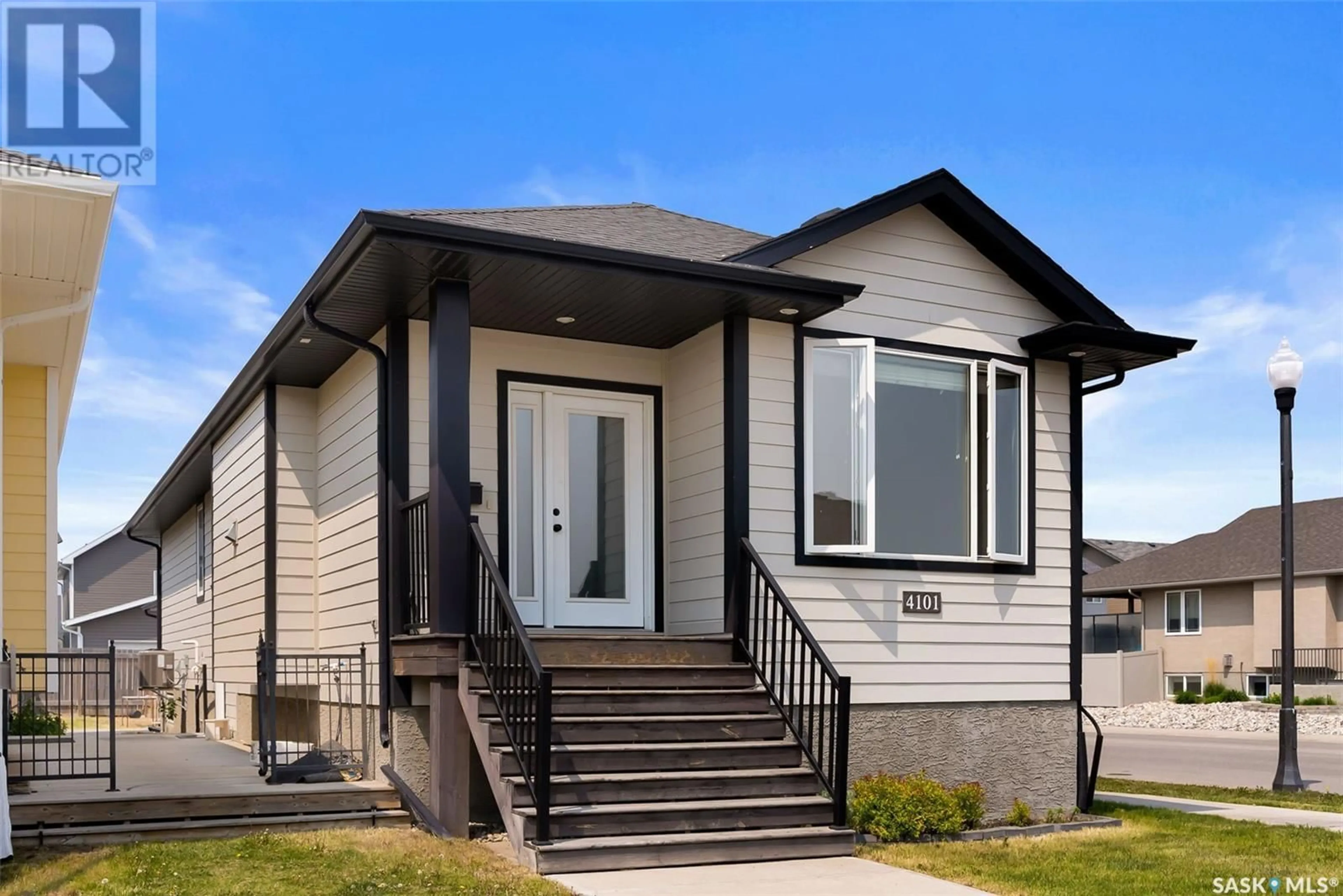 Home with vinyl exterior material, street for 4101 GREEN OLIVE WAY, Regina Saskatchewan S4V1P8