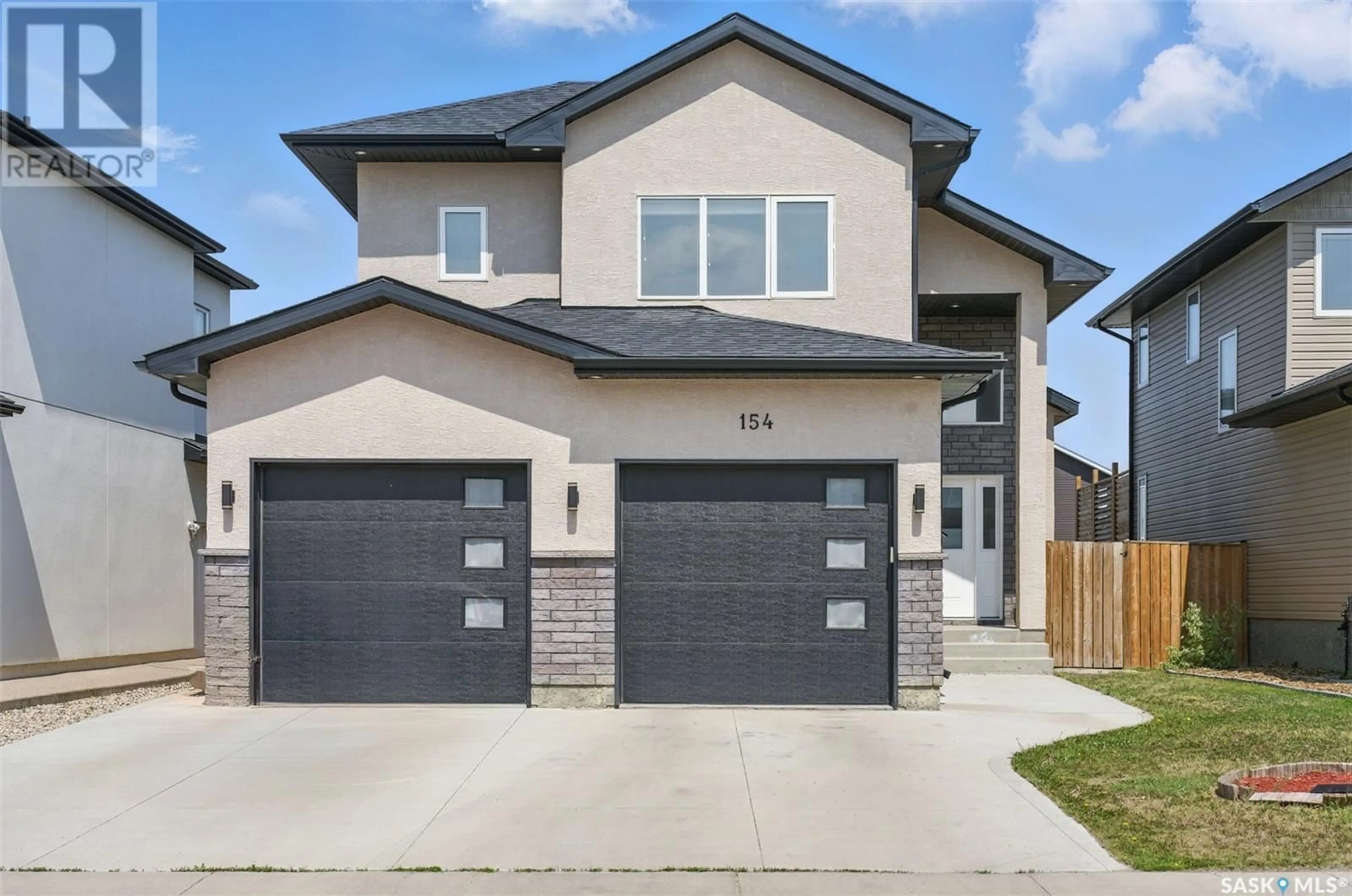 Home with brick exterior material, street for 154 FAST CRESCENT, Saskatoon Saskatchewan S7W0W9