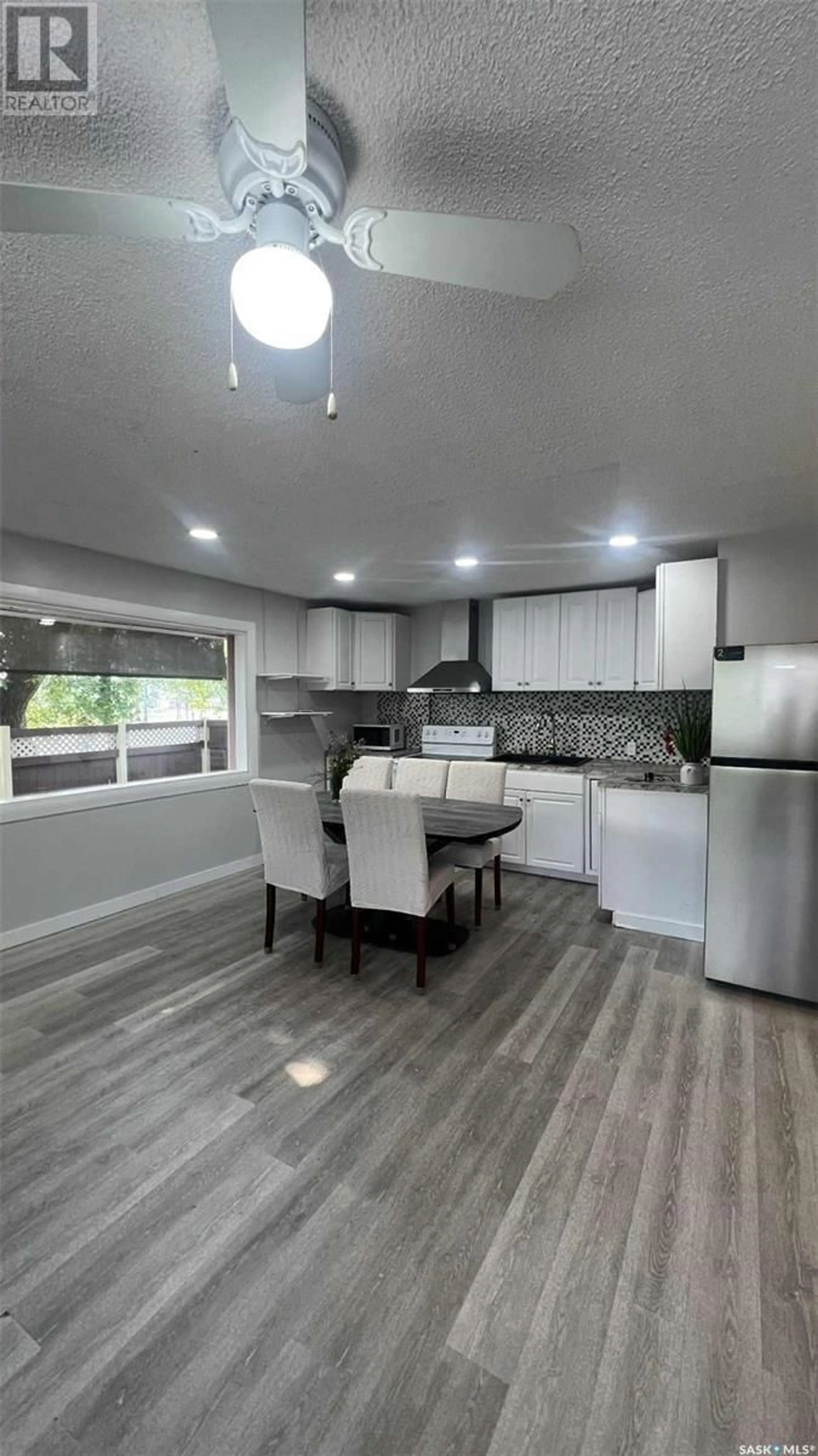 Open concept kitchen, wood/laminate floor for 271 BROAD STREET, Regina Saskatchewan S4R1X1