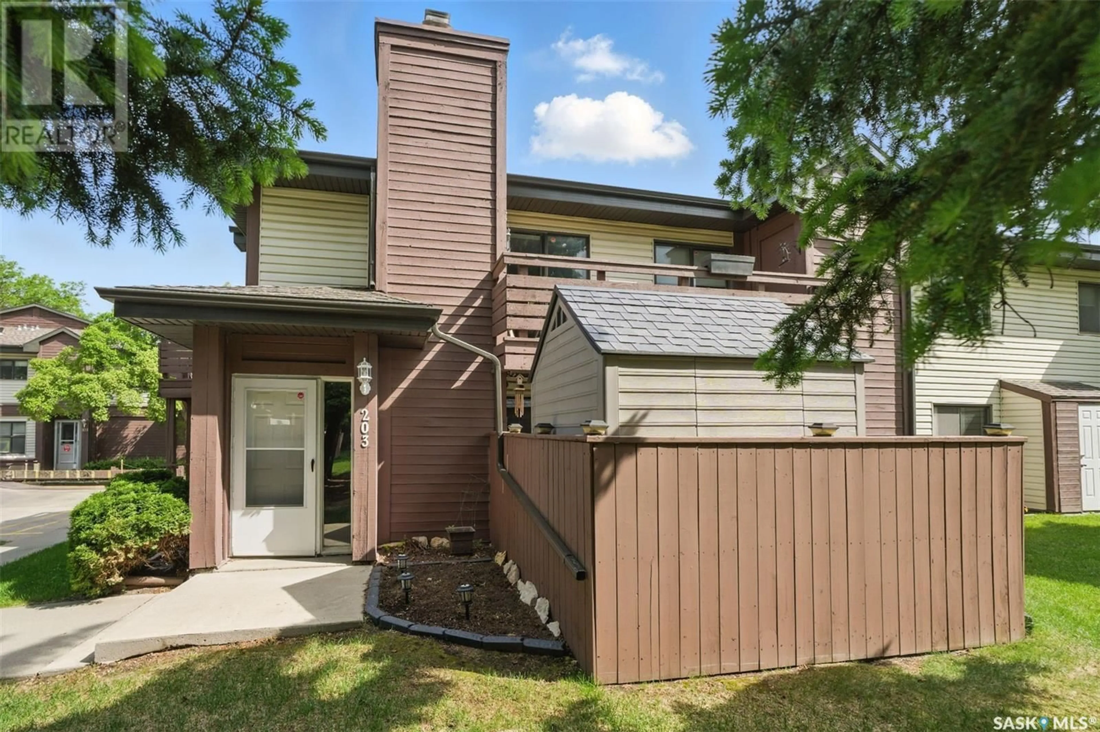 Home with brick exterior material, unknown for 203 - 443 PENDYGRASSE ROAD, Saskatoon Saskatchewan S7M5C1