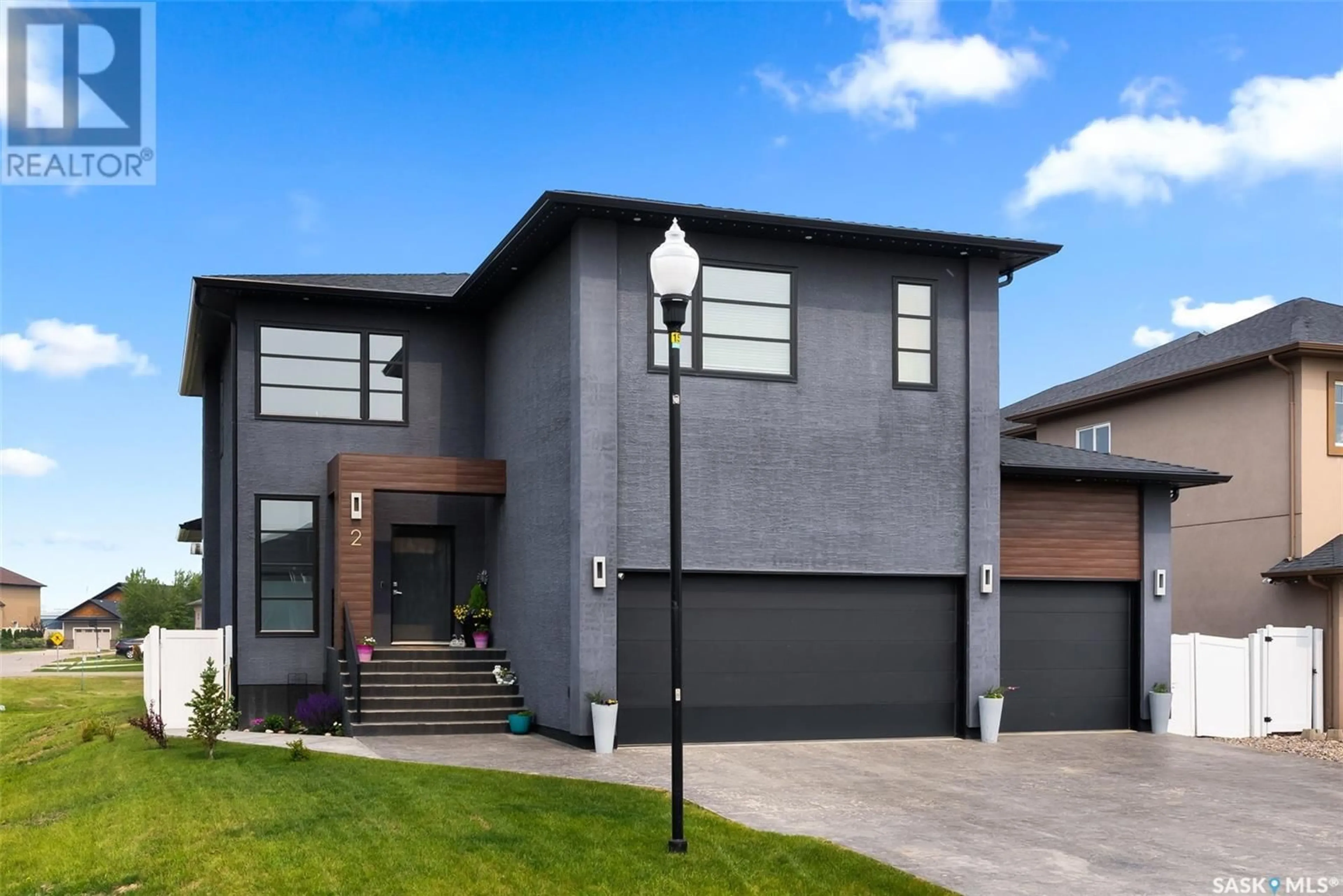 Home with brick exterior material, street for 2 MCKENZIE LANDING, White City Saskatchewan S4L0B2