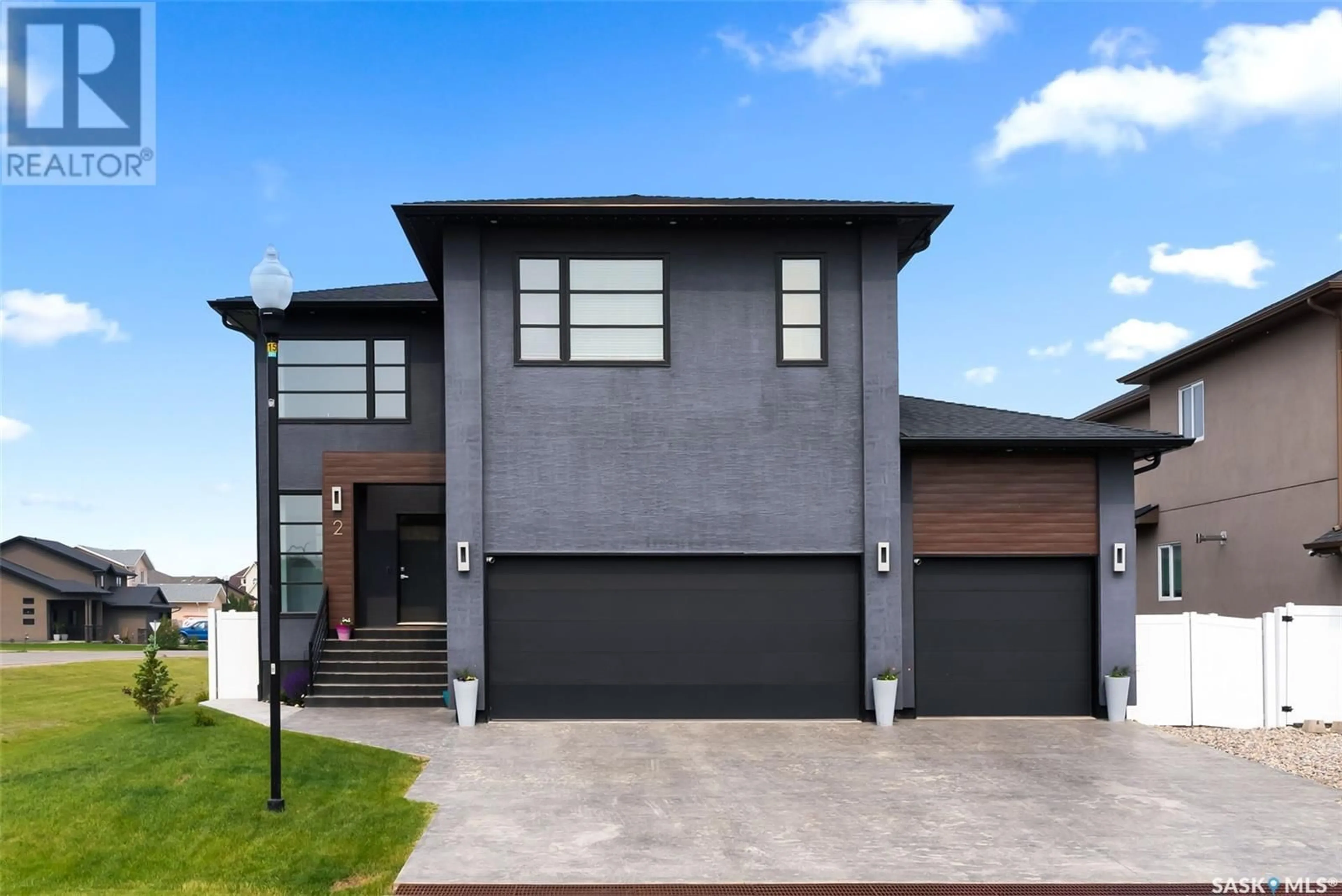 Home with brick exterior material, street for 2 MCKENZIE LANDING, White City Saskatchewan S4L0B2