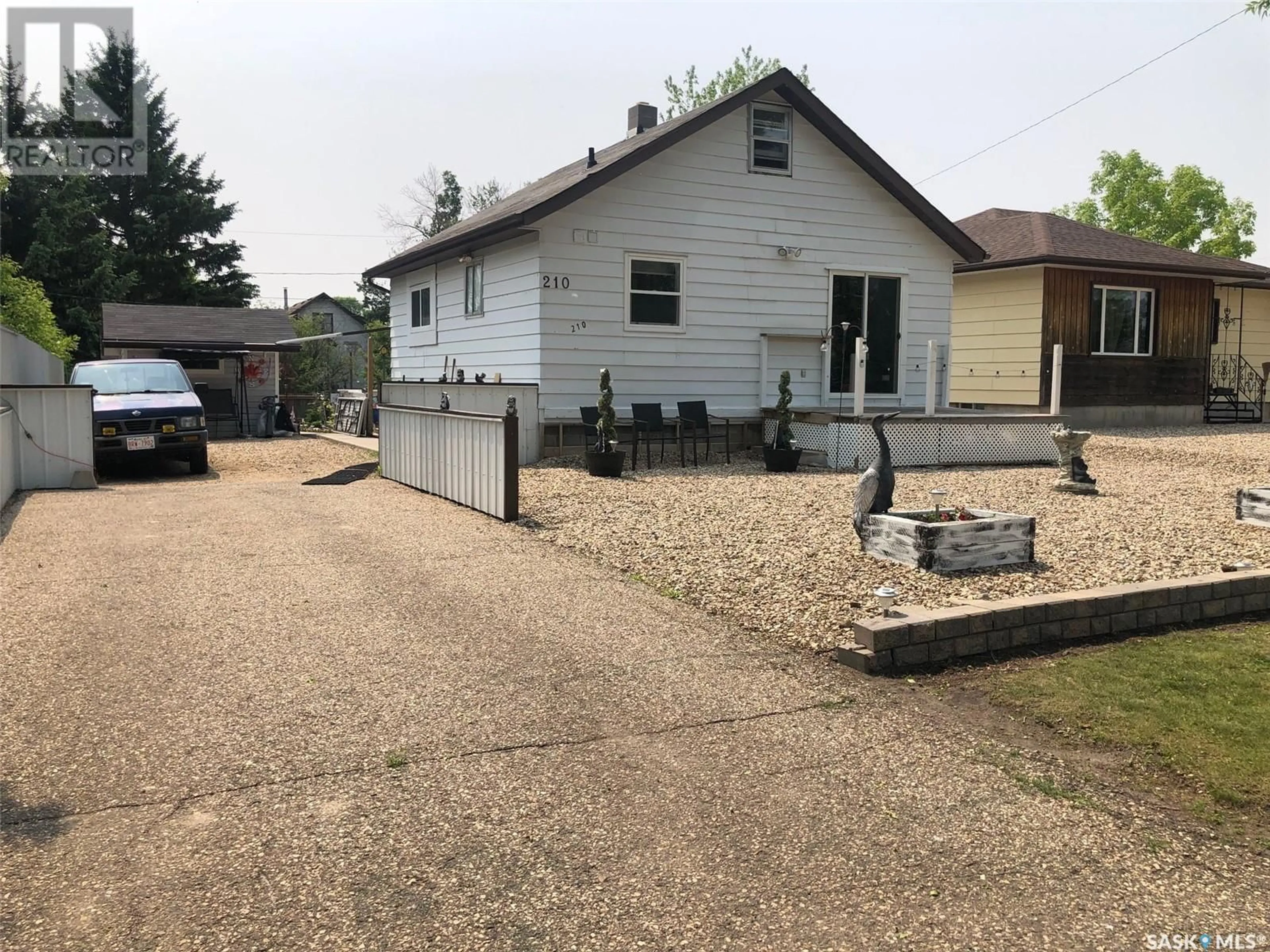 A pic from outside/outdoor area/front of a property/back of a property/a pic from drone, street for 210 ROSLYN AVENUE, Canora Saskatchewan S0A0L0