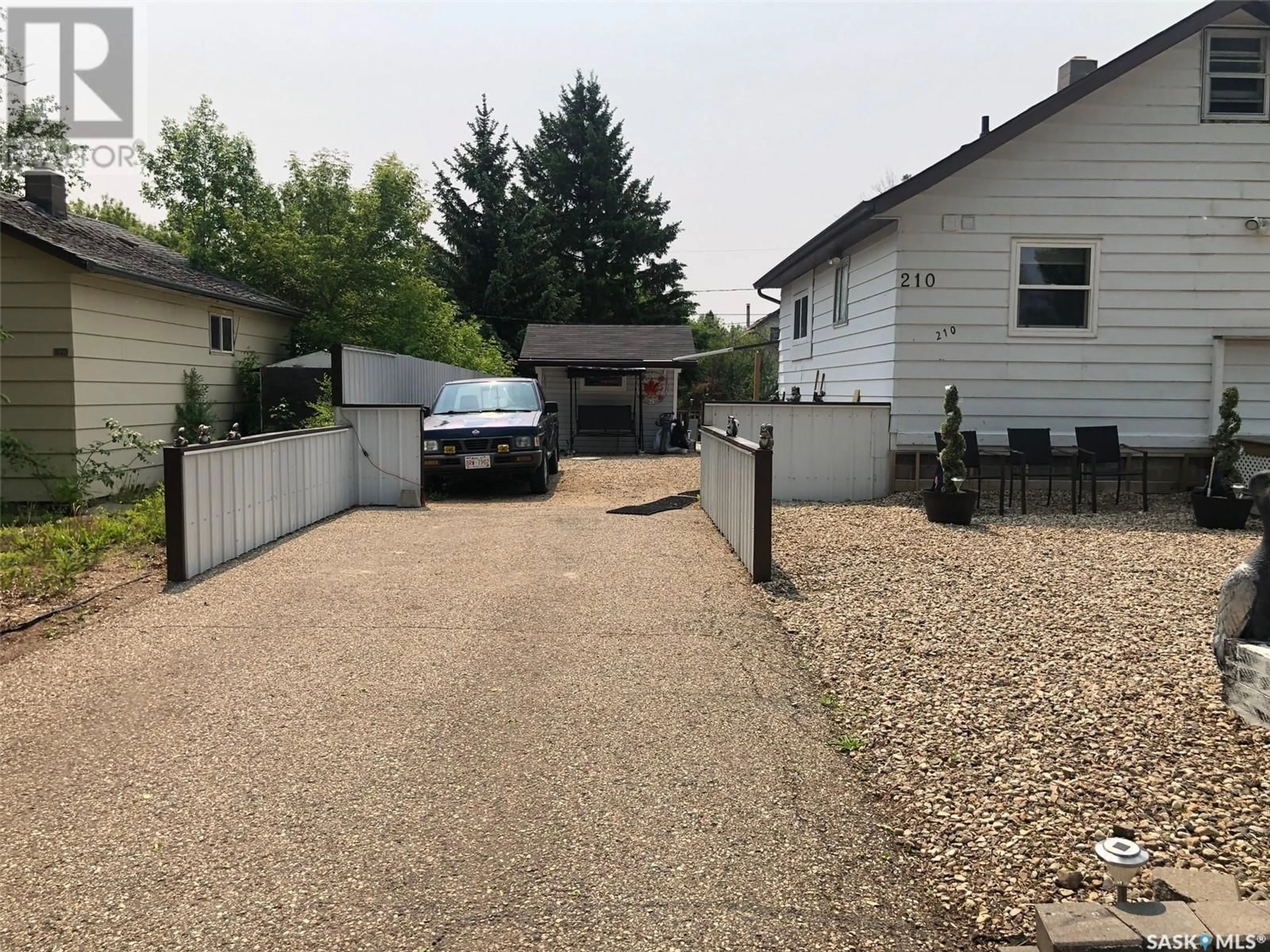 A pic from outside/outdoor area/front of a property/back of a property/a pic from drone, street for 210 ROSLYN AVENUE, Canora Saskatchewan S0A0L0