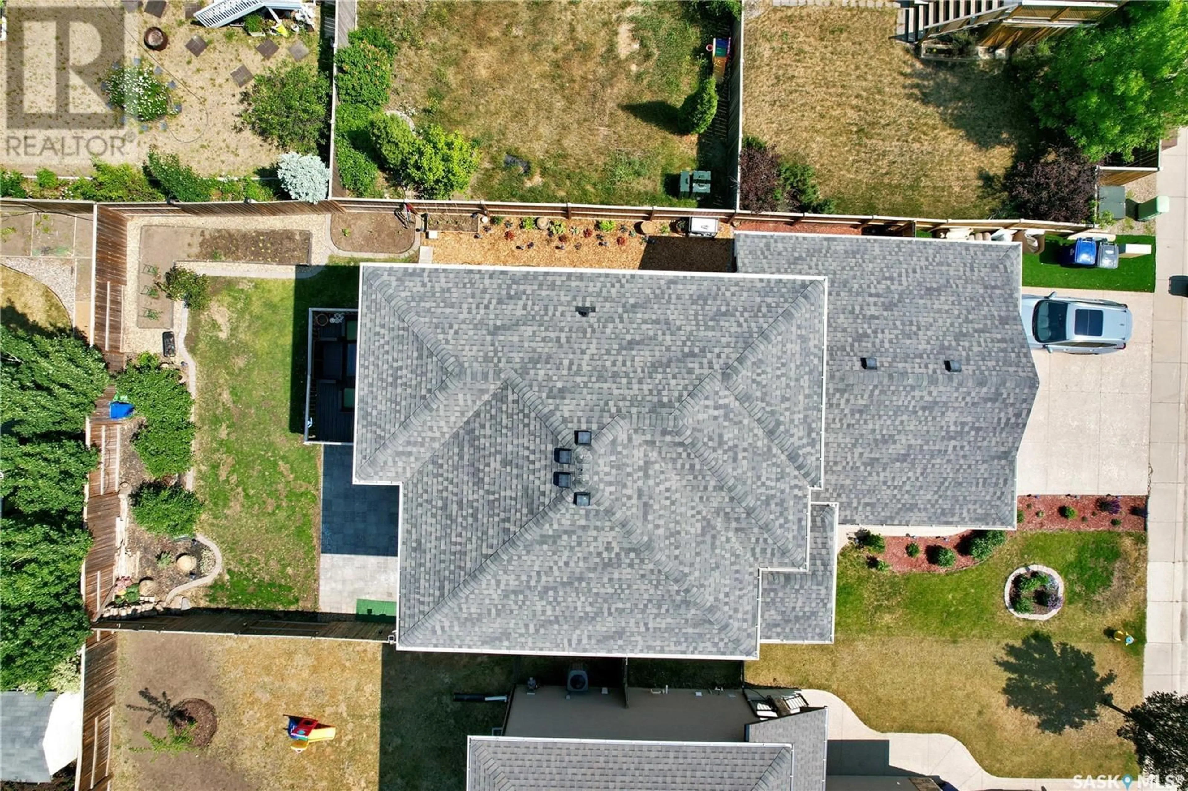 A pic from outside/outdoor area/front of a property/back of a property/a pic from drone, unknown for 627 REMPEL CRESCENT, Saskatoon Saskatchewan S7T0J2