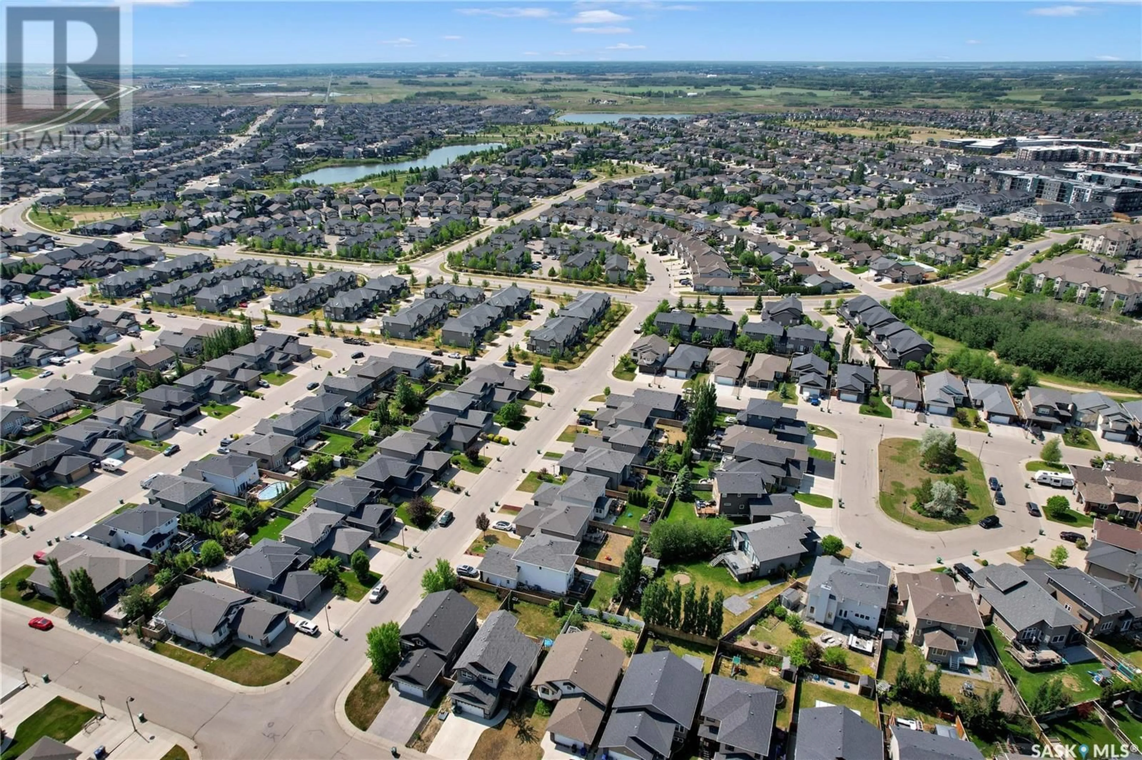 A pic from outside/outdoor area/front of a property/back of a property/a pic from drone, street for 627 REMPEL CRESCENT, Saskatoon Saskatchewan S7T0J2