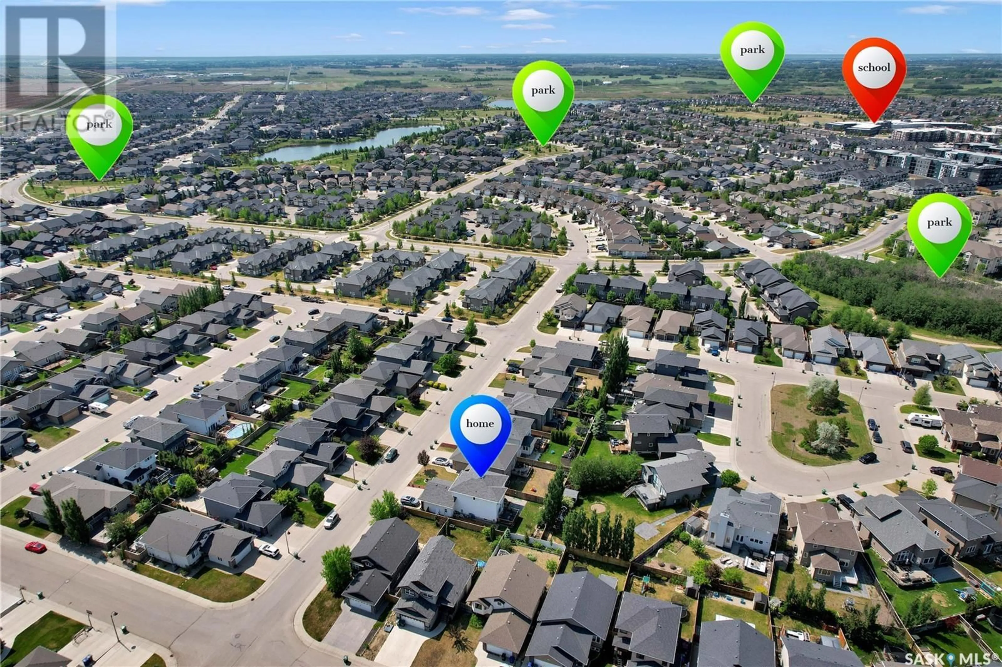 A pic from outside/outdoor area/front of a property/back of a property/a pic from drone, street for 627 REMPEL CRESCENT, Saskatoon Saskatchewan S7T0J2
