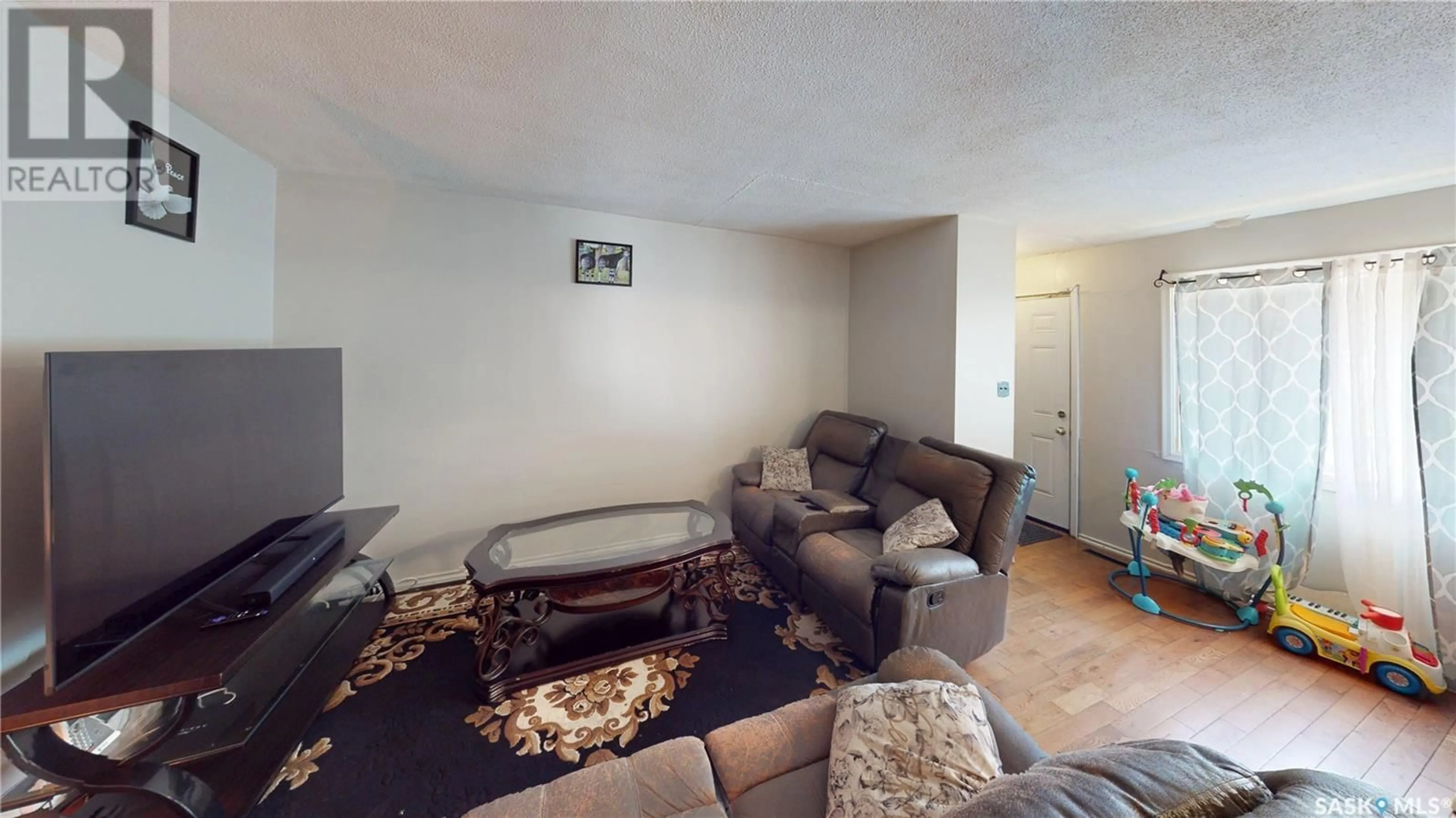 Living room with furniture, unknown for 54 FROOM CRESCENT, Regina Saskatchewan S4N0T9