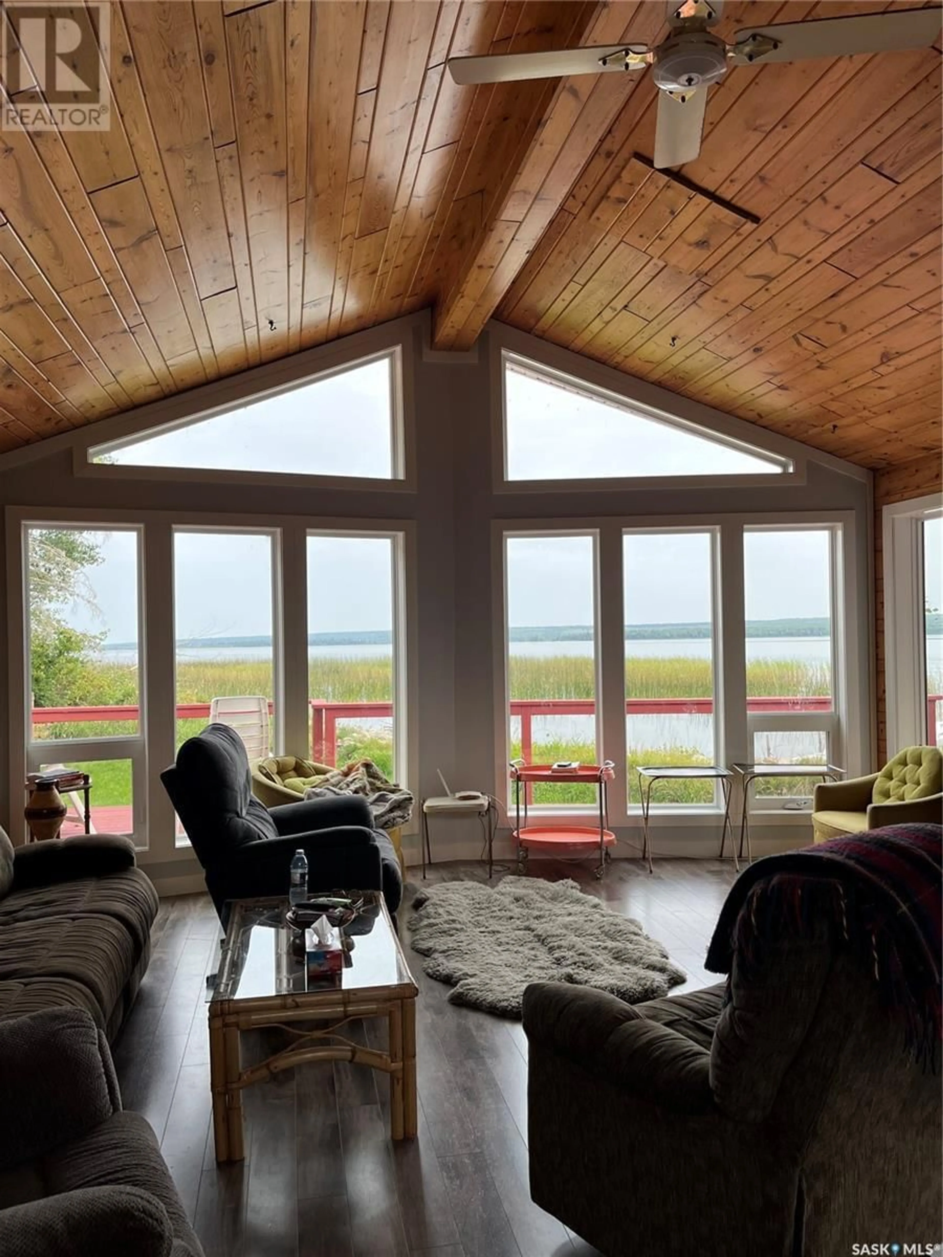 Living room with furniture, wood/laminate floor for 1 CRONE BAY, Big River Rm No. 555 Saskatchewan S0J0E0