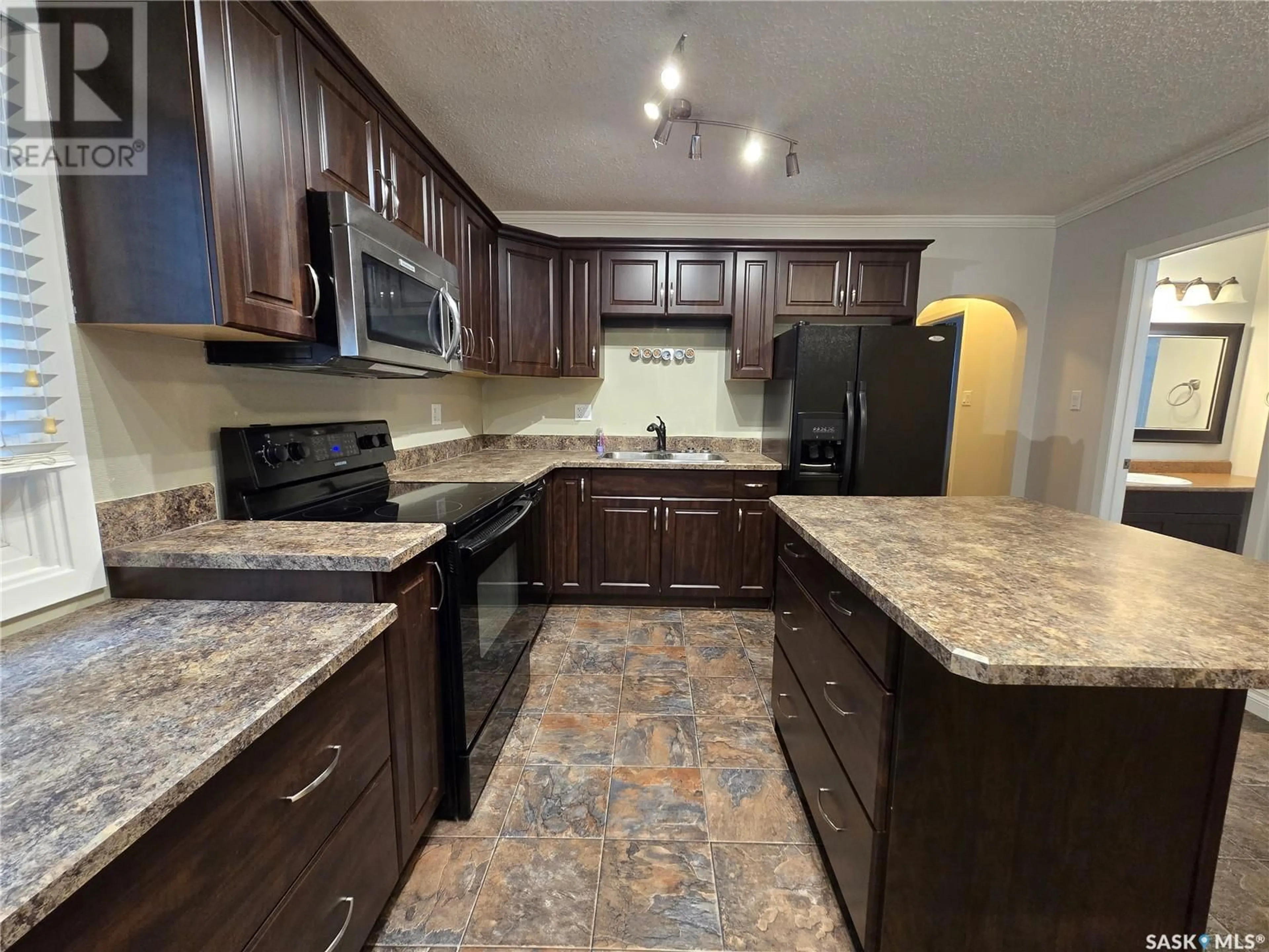 Standard kitchen, ceramic/tile floor for E - 300 MAPLE STREET, Saskatoon Saskatchewan S7J0A5