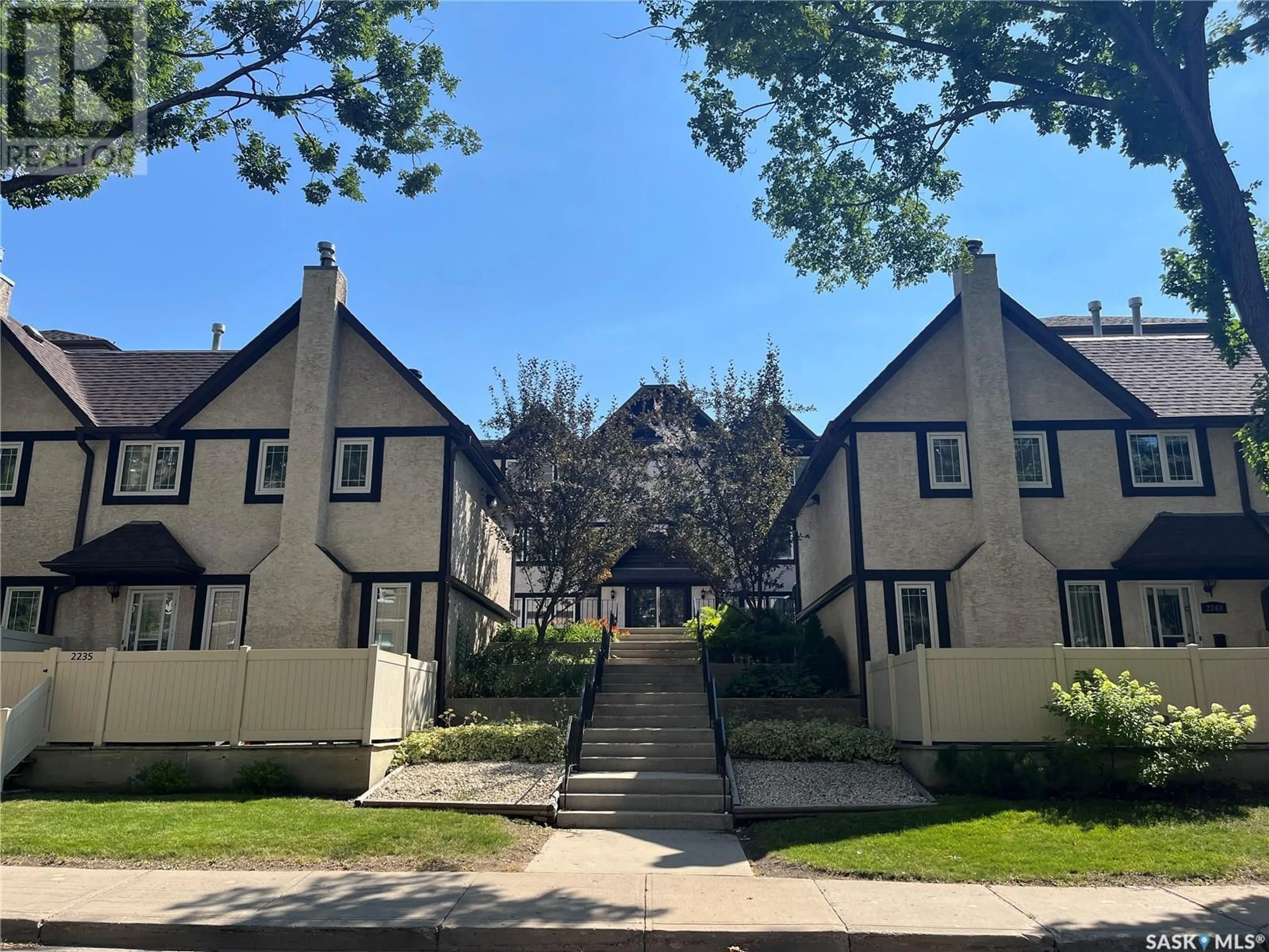 A pic from outside/outdoor area/front of a property/back of a property/a pic from drone, street for 206 - 2237 MCINTYRE STREET, Regina Saskatchewan S4P2S1