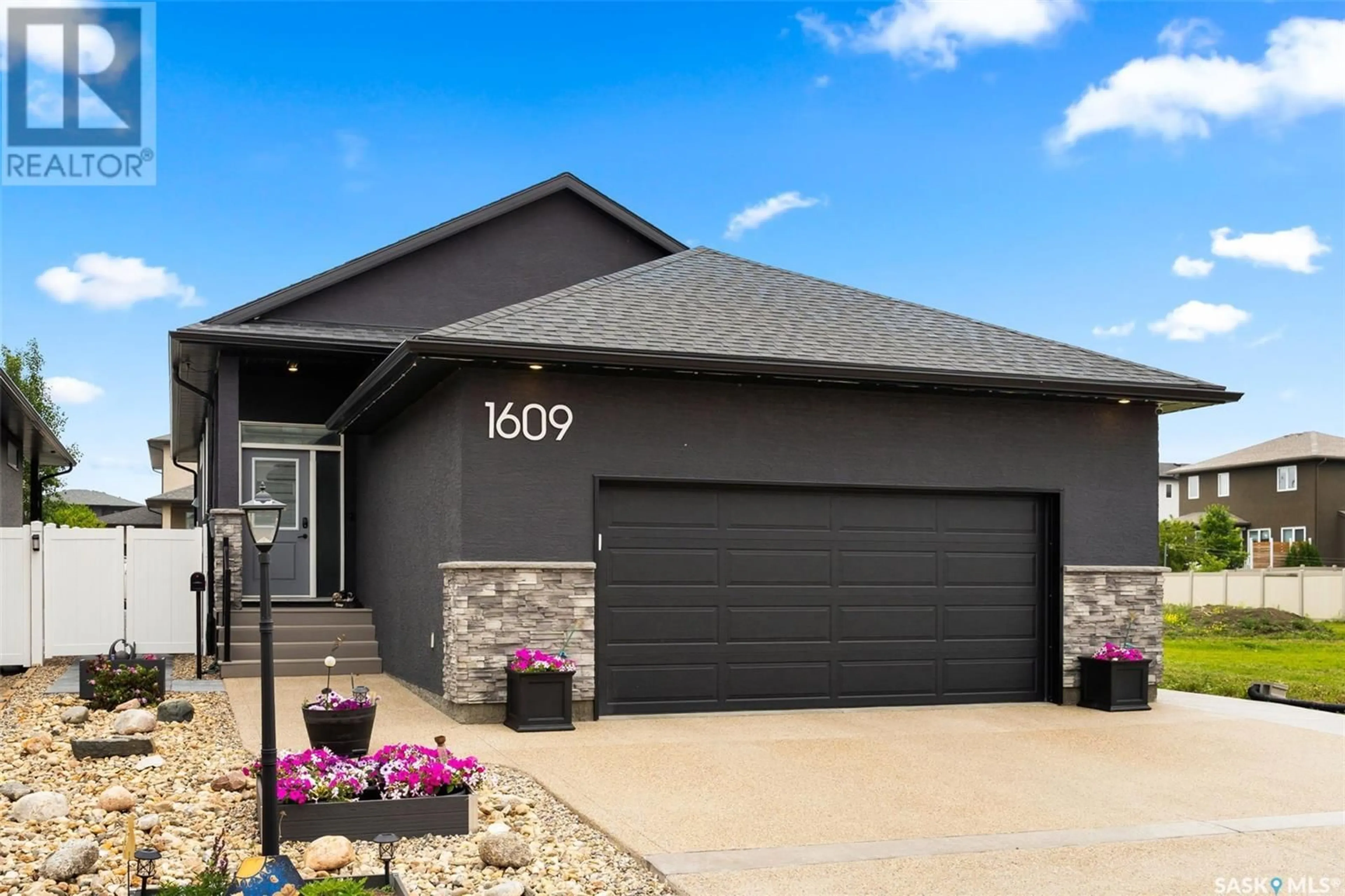 Home with brick exterior material, street for 1609 MAPLE STREET, Regina Saskatchewan S4X0P3