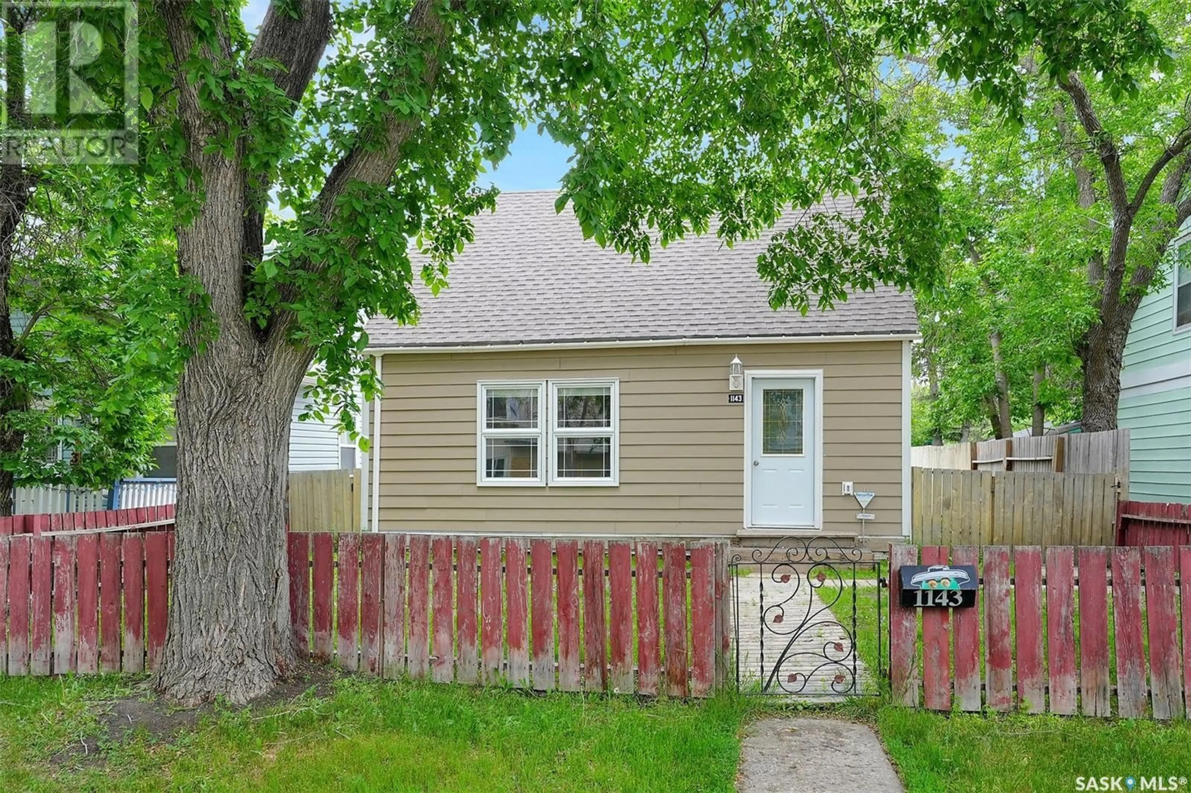 Home with vinyl exterior material, street for 1143 WASCANA STREET, Regina Saskatchewan S4T4H9