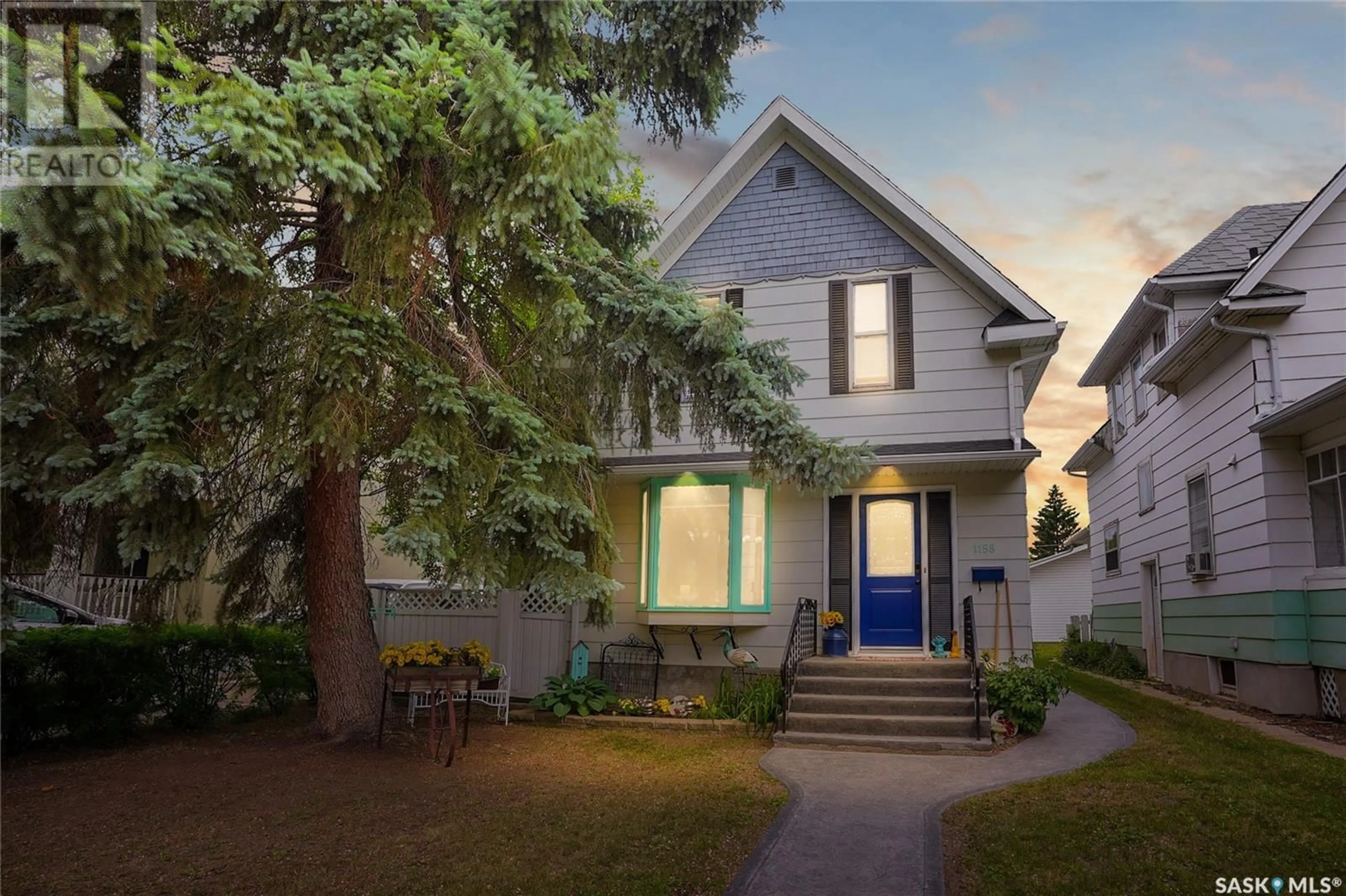 Home with vinyl exterior material, street for 1158 ALDER AVENUE, Moose Jaw Saskatchewan S6H0Y7