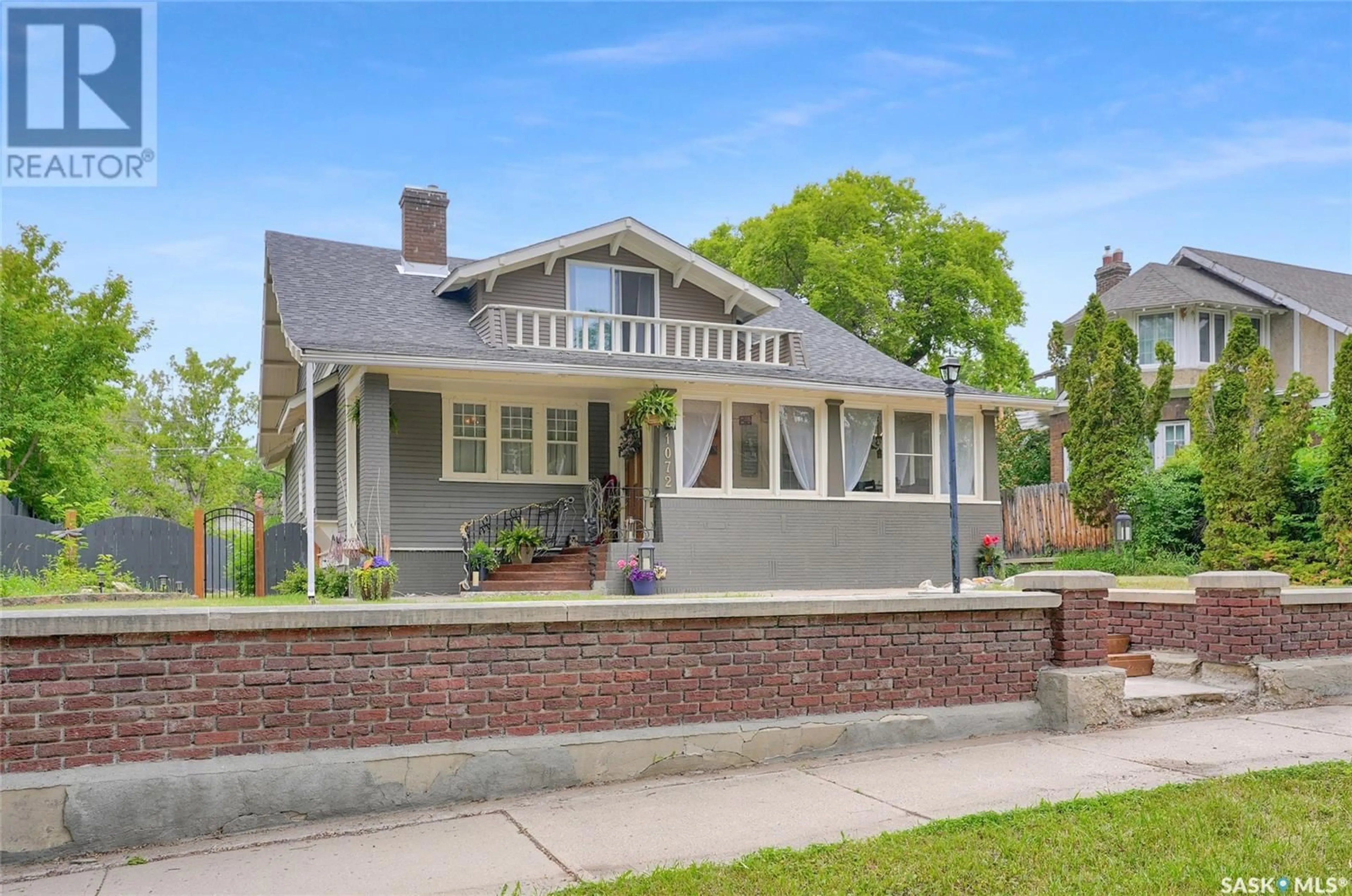 Home with brick exterior material, street for 1072 2ND AVENUE, Moose Jaw Saskatchewan S6H0W2