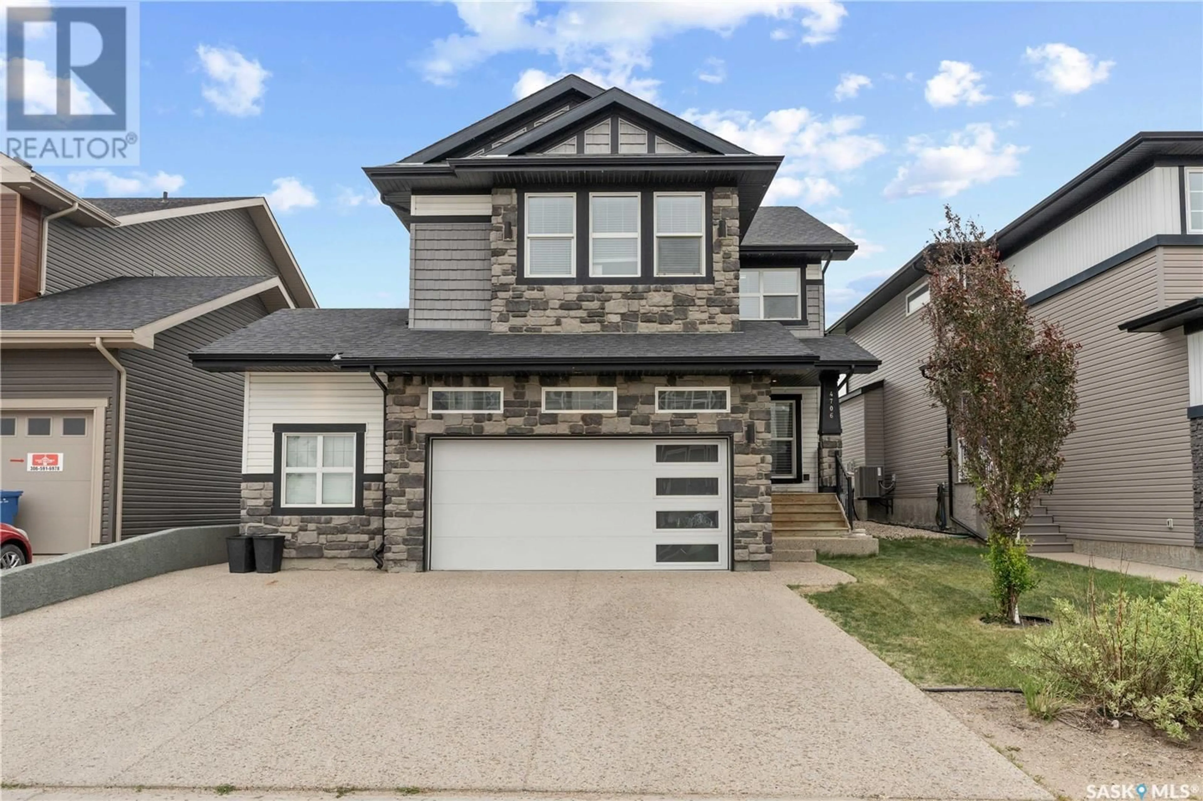 Home with vinyl exterior material, street for E - 4706 GREEN APPLE DRIVE, Regina Saskatchewan S4V3L2