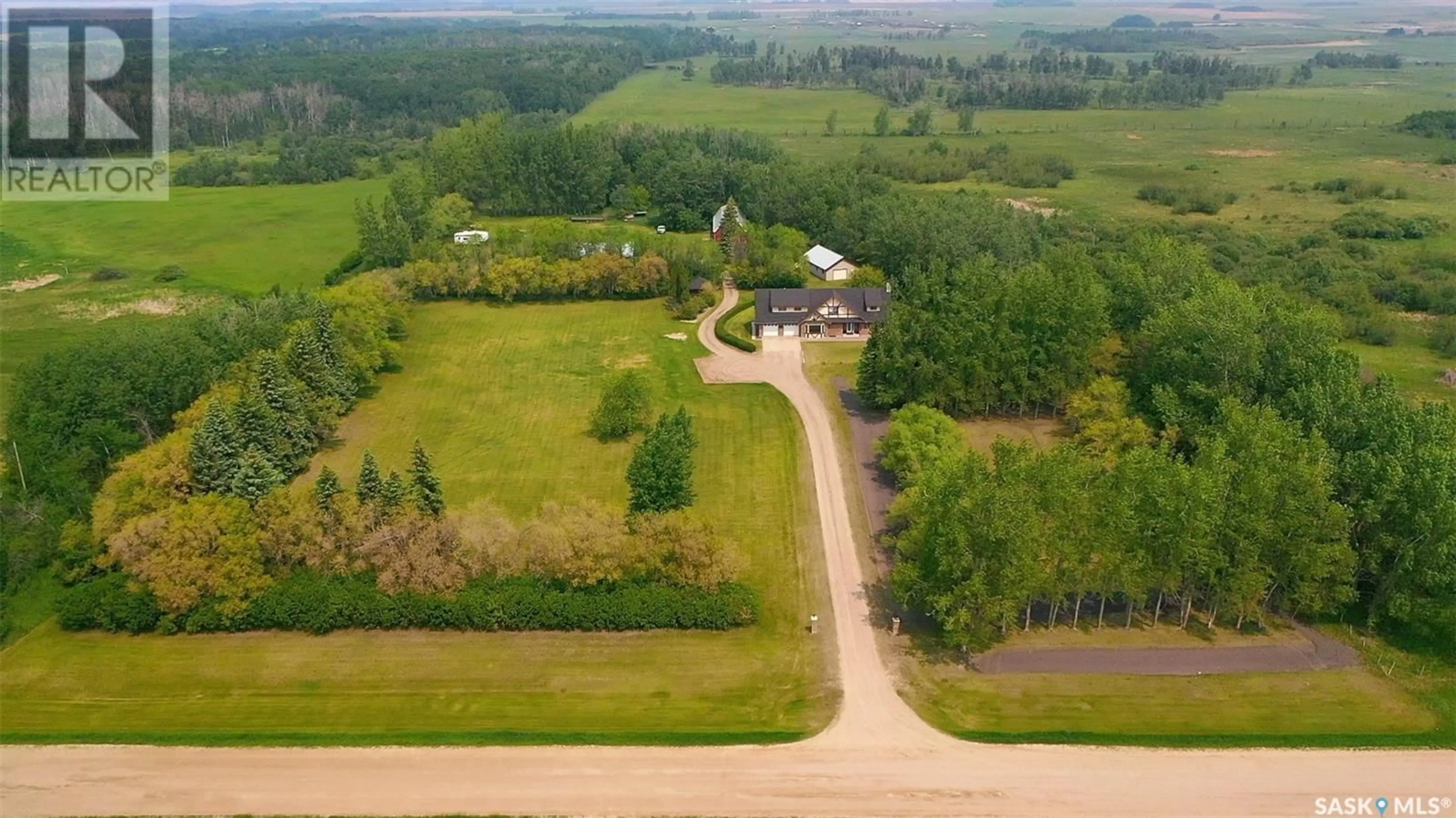 A pic from outside/outdoor area/front of a property/back of a property/a pic from drone, unknown for WALSH ACREAGE, Orkney Rm No. 244 Saskatchewan S3N4K1